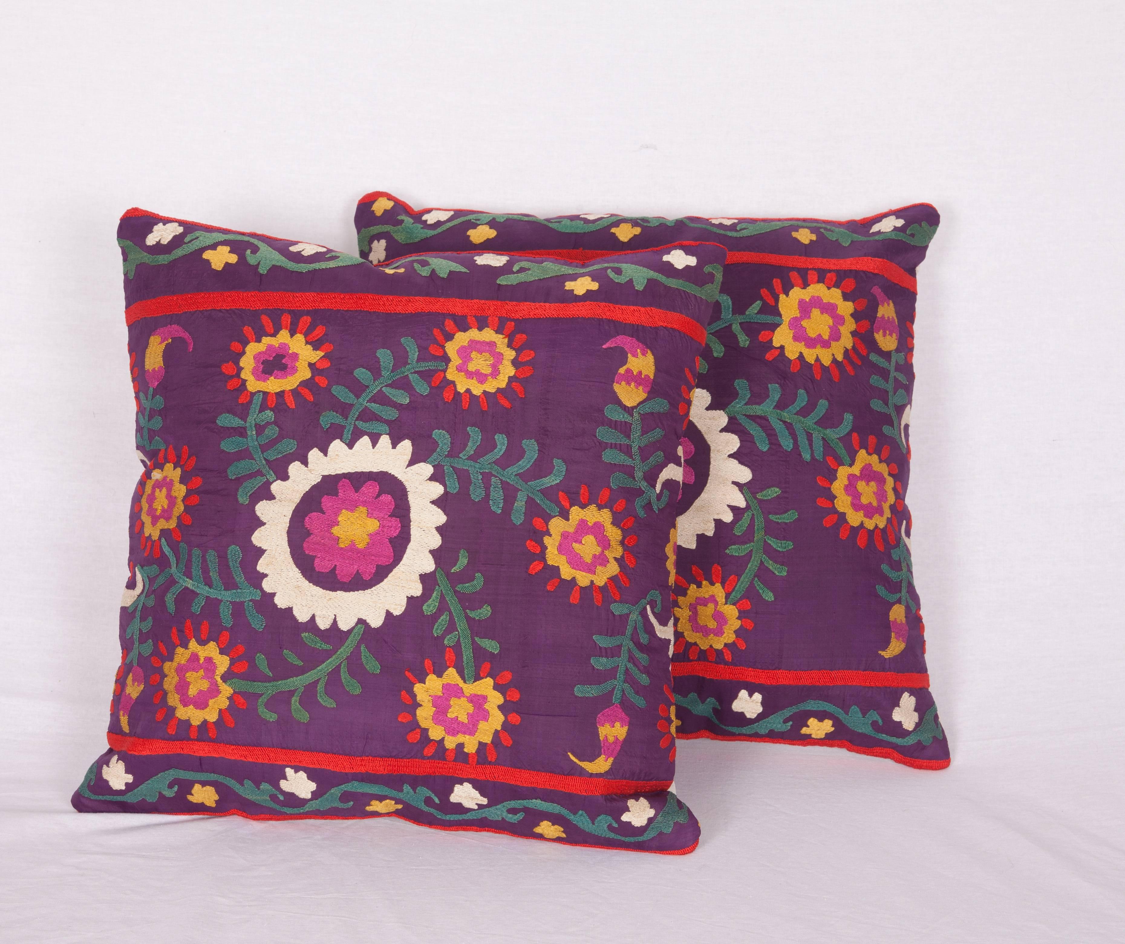 The pillow cases are made out of an early 20th century Uzbek Samarkand silk Suzani. It does not come with an insert but it comes with a bag made to the size and out of cotton to accommodate the filling. The backing is made of linen. Please note '