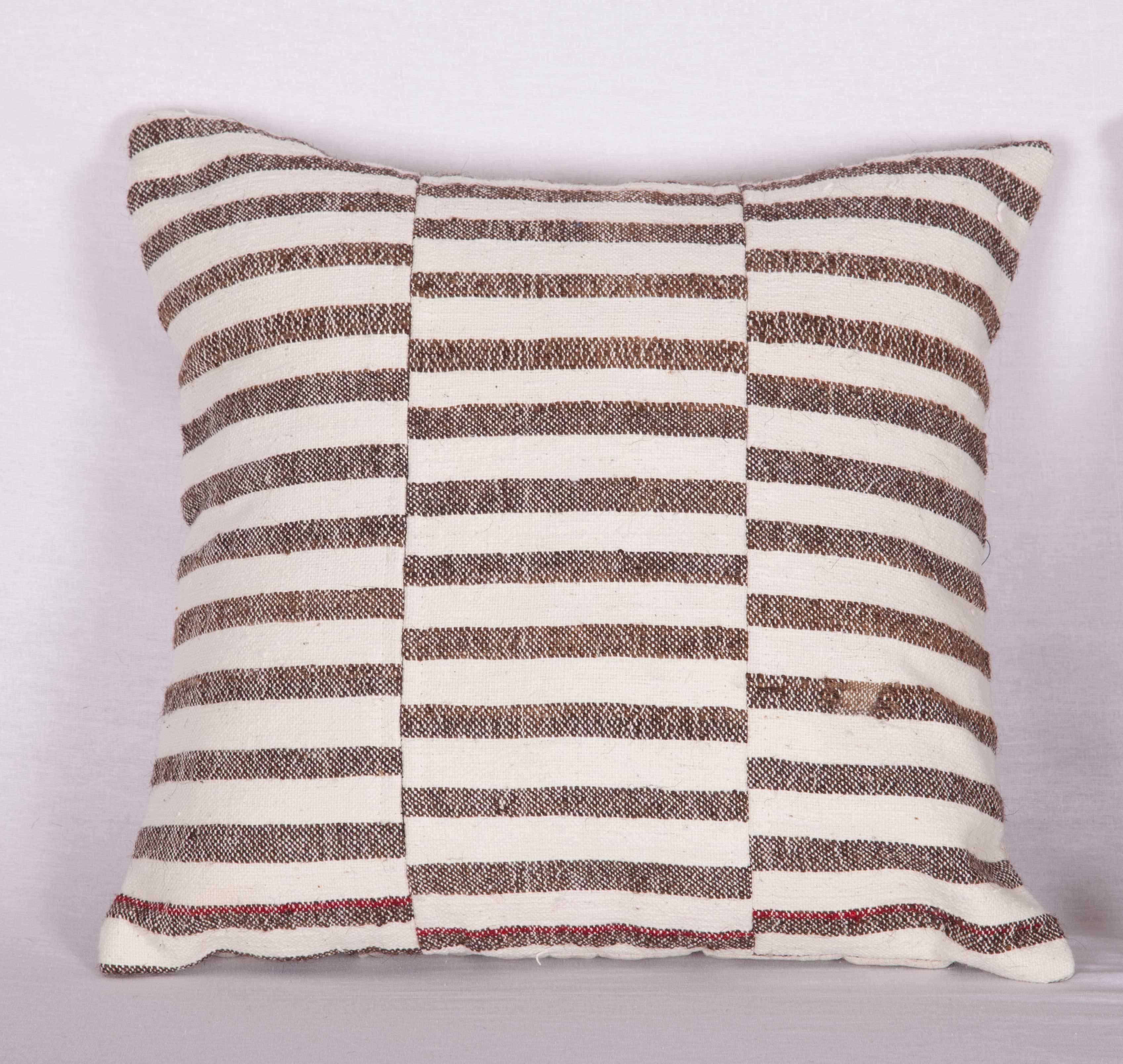 Pillow cases are made from a vintage Anatolian Kilim.
They do not come with an insert but they come with a bag made to the size and out of cotton to accommodate the filling for each.
The backing is made of linen.
Please note filling is not