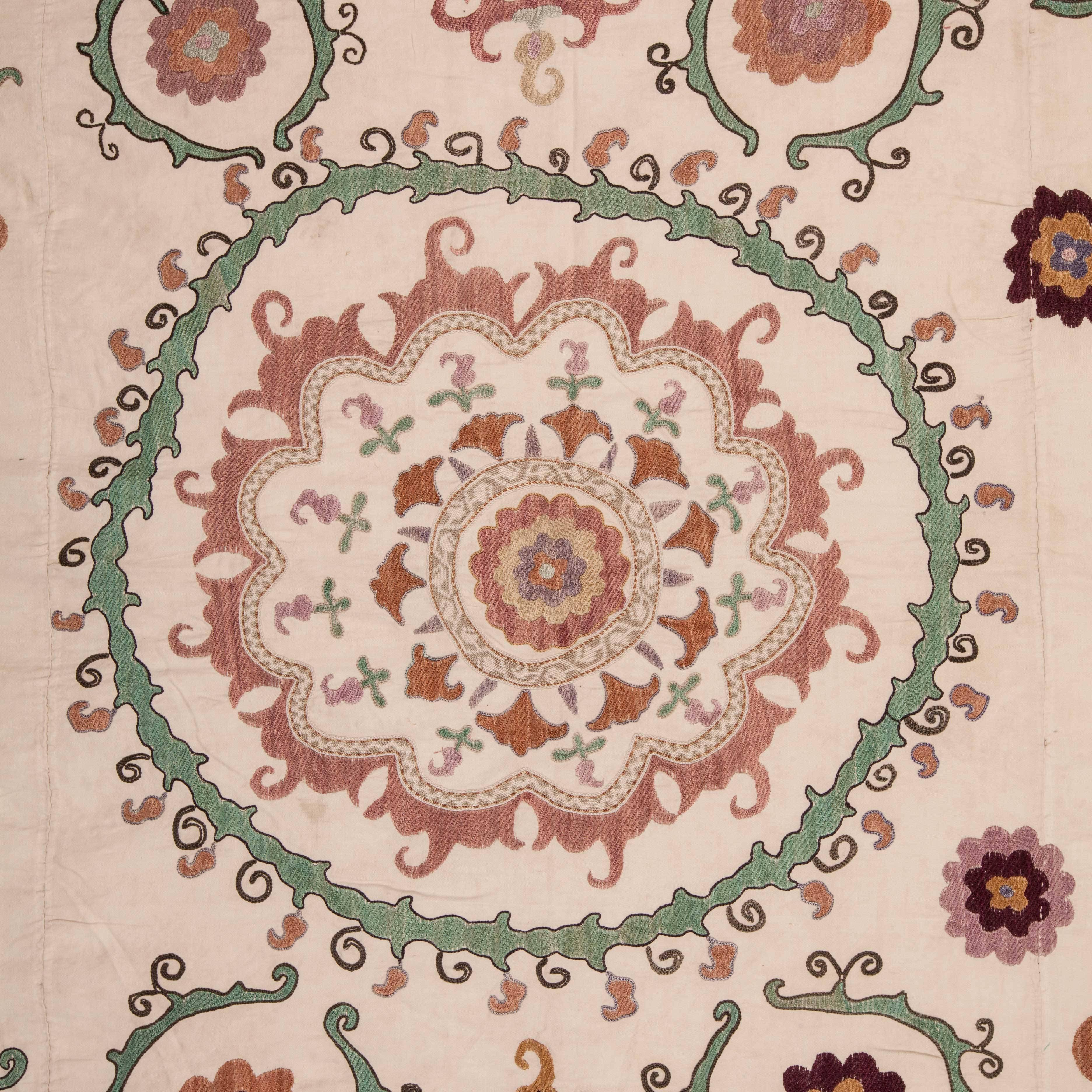 Suzani has soft colors and in fairly good condition.

‘Suzani’ meaning ‘needle’ so ‘needle work ‘ in Persian, refgers to a group of embroideries mainly done in Central Asia, in countries such as , Uzbekistan, Tajikistan. Suzanies in todays textile