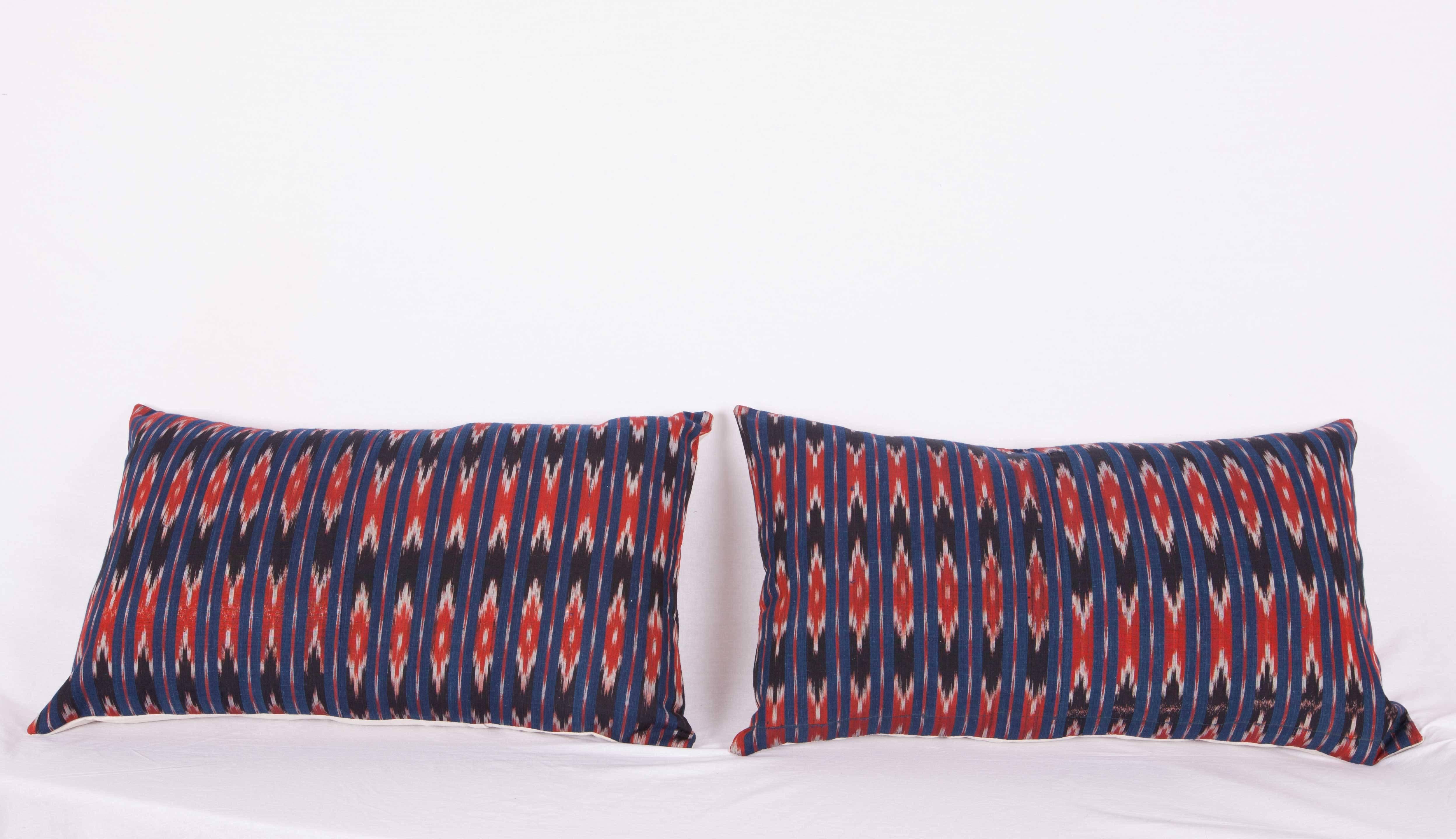 The pillows are made out of old Ikat panel probably from Syria. They do not come with an insert but they come with a bag made to the size and out of cotton to accommodate the filling. The backing is made of linen. Please note filling is not