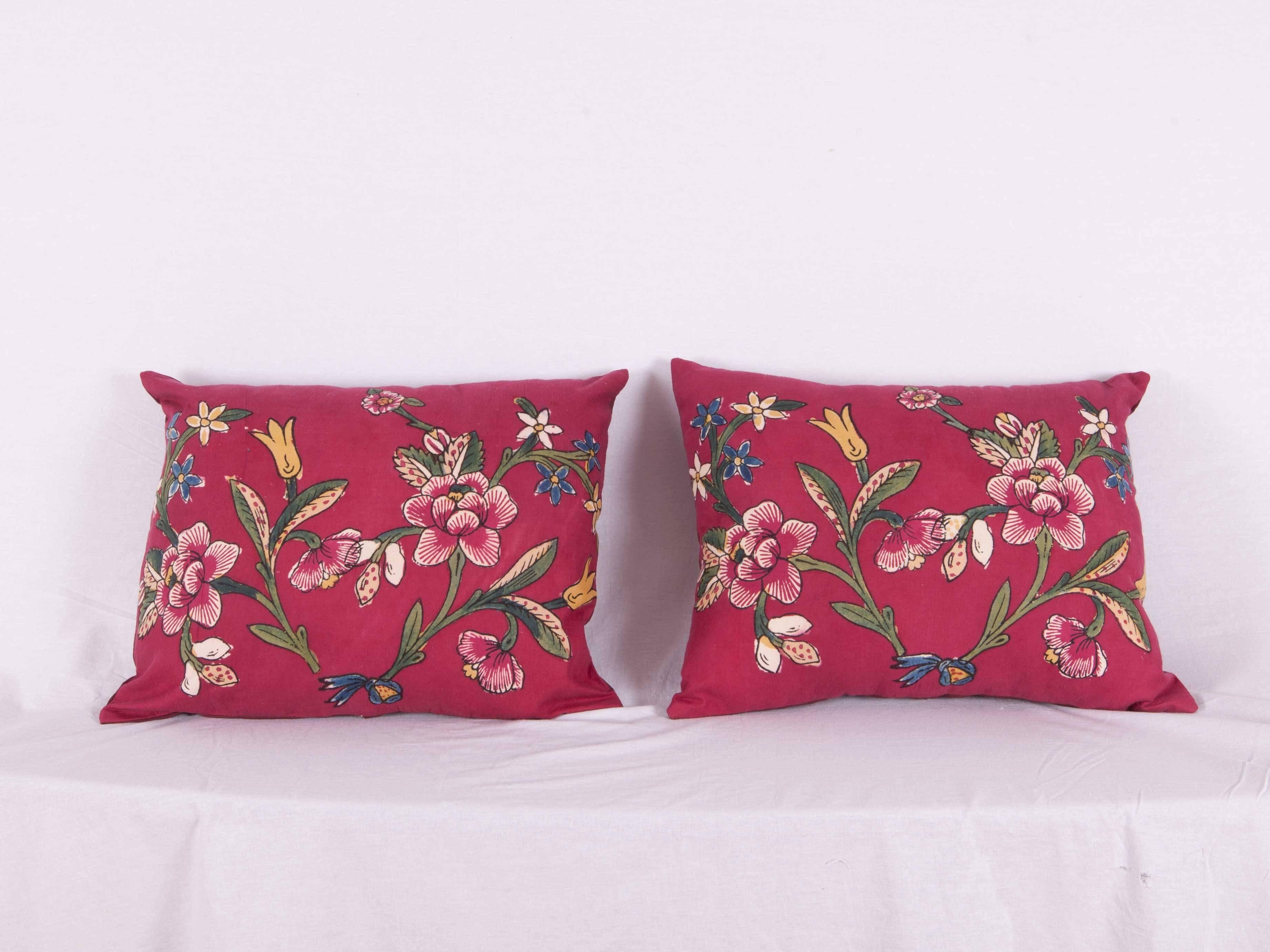 The pillow cases are made out of a mid-20th century, Turkish hand block printed cotton textile. They do not come with an insert but it come with a bag made to the size and out of cotton to accommodate the filling. The backing is made of linen.