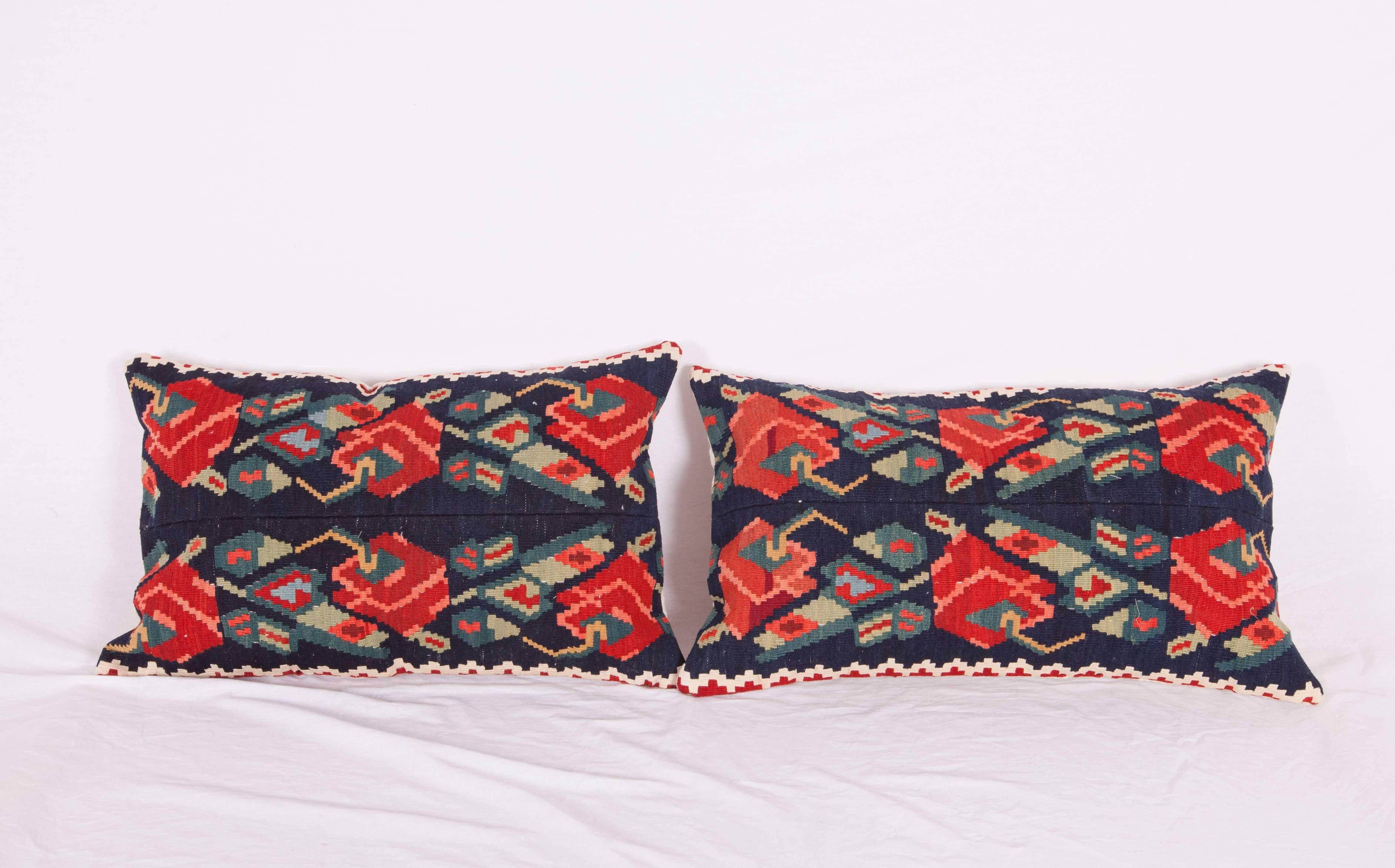 Pillow cases are made from an early 20th C. Caucaisan Karabagh rmenian kilim, have backings made from a hand loomed vintage wool and cotton fabric.
Inserts for them are not provided but they come with a cotton bag made to the size.
Dry clean and