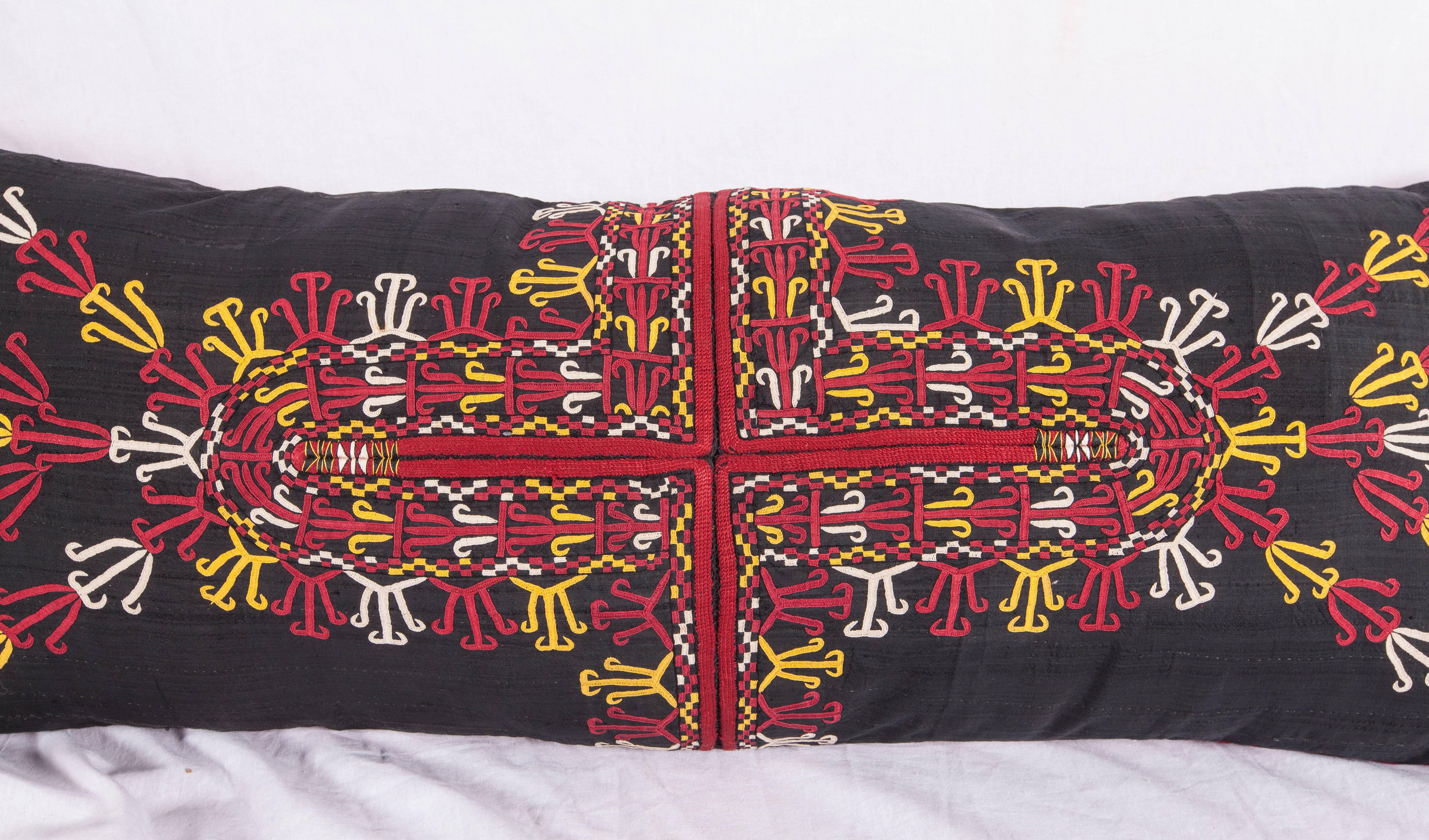 a lovely pillow with very fine silk embroidery fashioned from a Central Asian Turkmen Tekke Tribe coat.
Backing is cotton and it comes with a bag to accomodate insert material.
Please note , no insert is provided.
Dry Clean Only
since the item