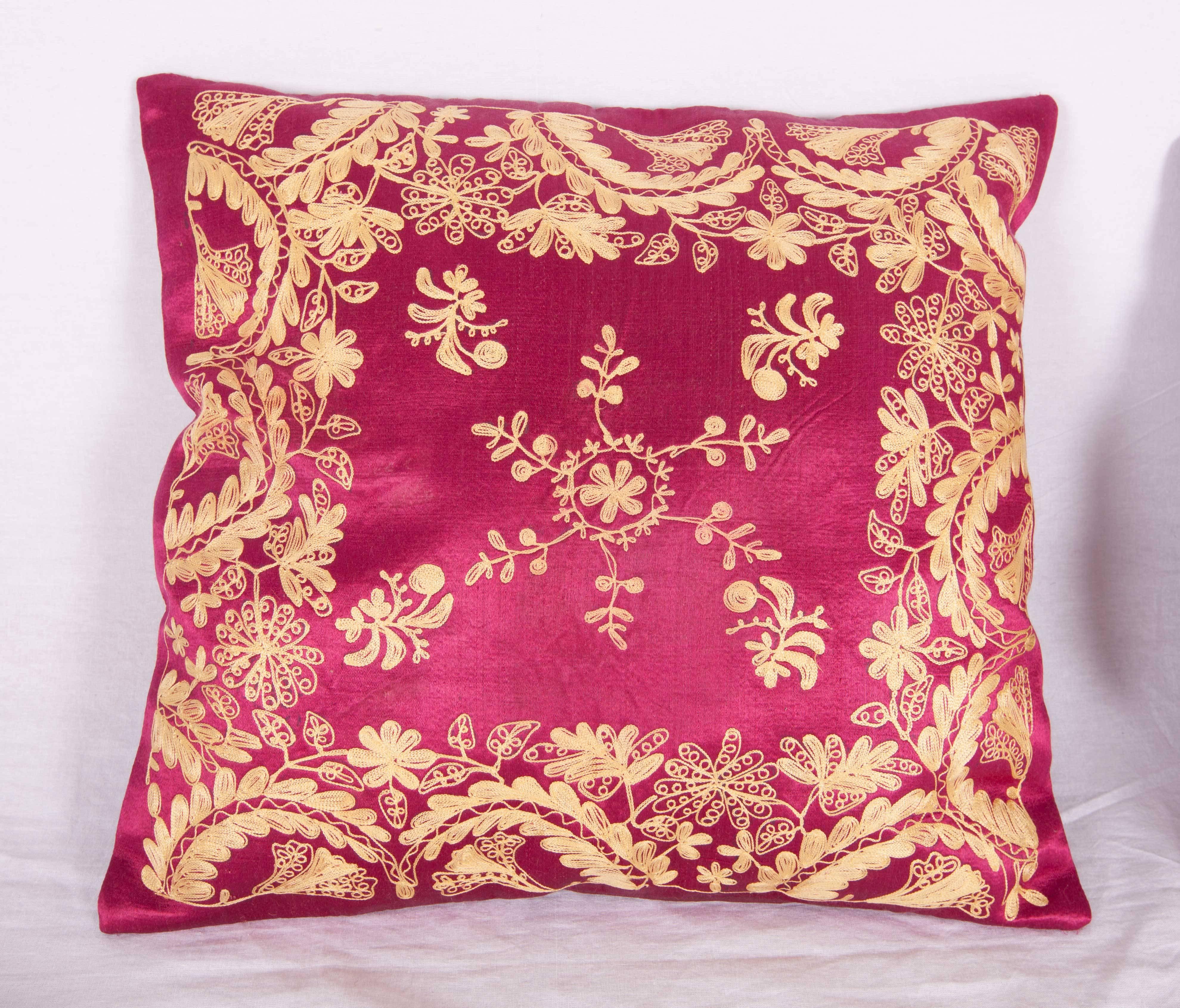 Late 19th / early 20th Century pillow cases , embroidered in silk on a satin silk background. The backing has been replaced with a hand loomed silk and cotton fabric. Insert is not provided but it comes with a bag to accommodate insert material .