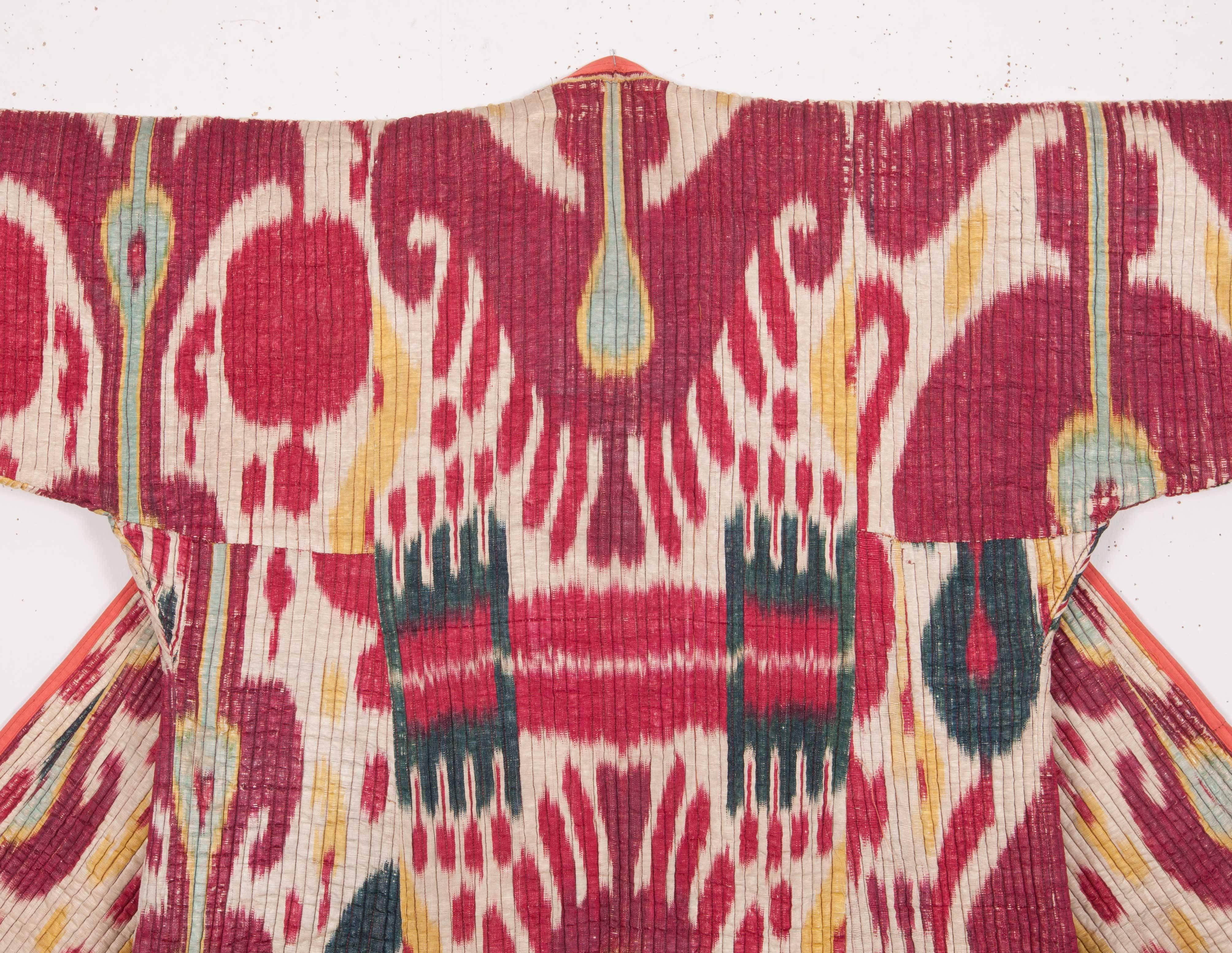 Quilted Ikat capans are usually from Khorazm of Uzbekistan and they usually display one or two types of Ikat. In the whole group, the Ikat used for this chapan is far different from its group.
Measures: Neck to hem 118 cm /46.46 inches
Sleeve to