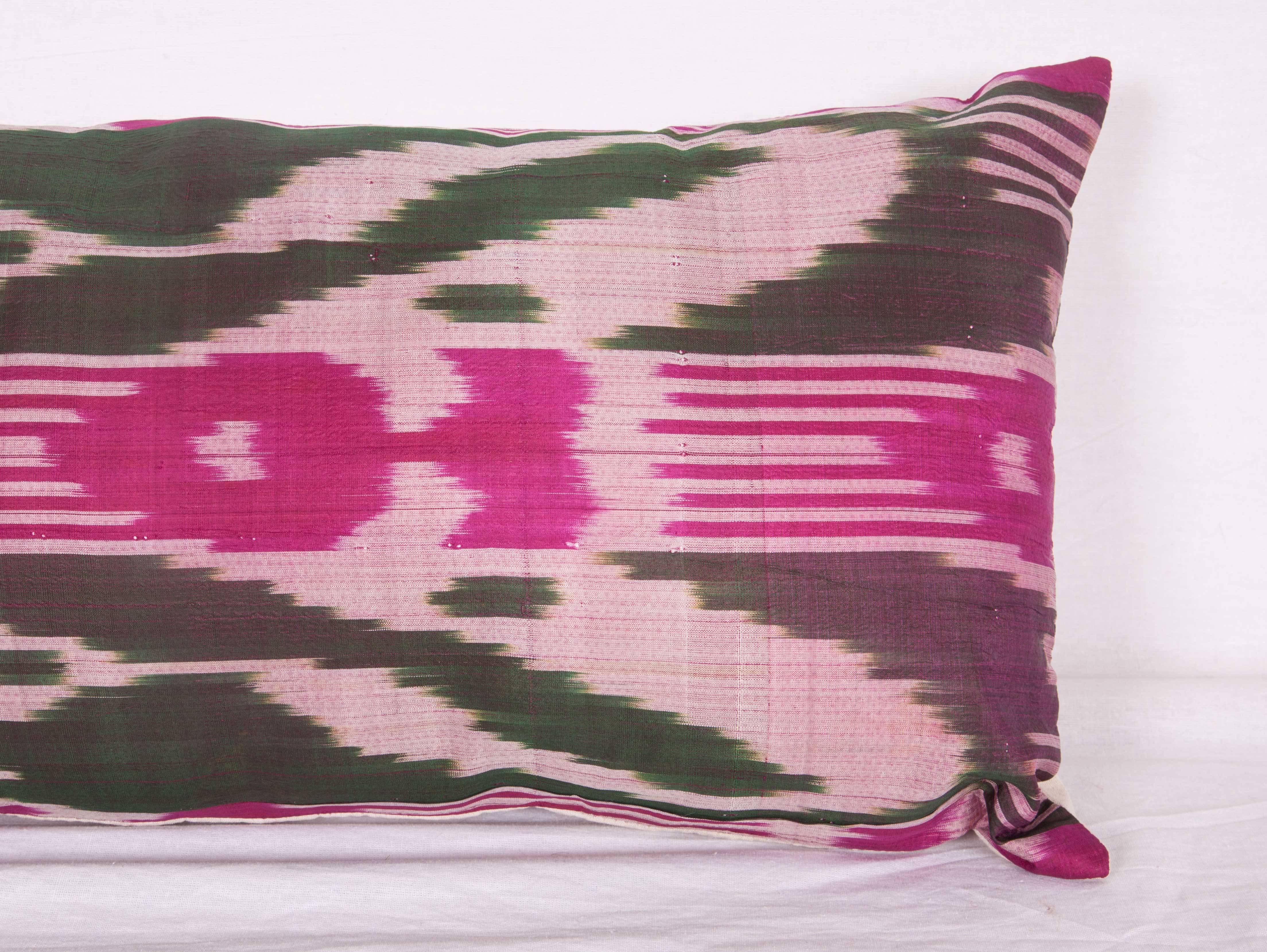 Tribal Antique Ikat Pillow Case Fashioned from Early 20th Century Uzbek Ikat For Sale
