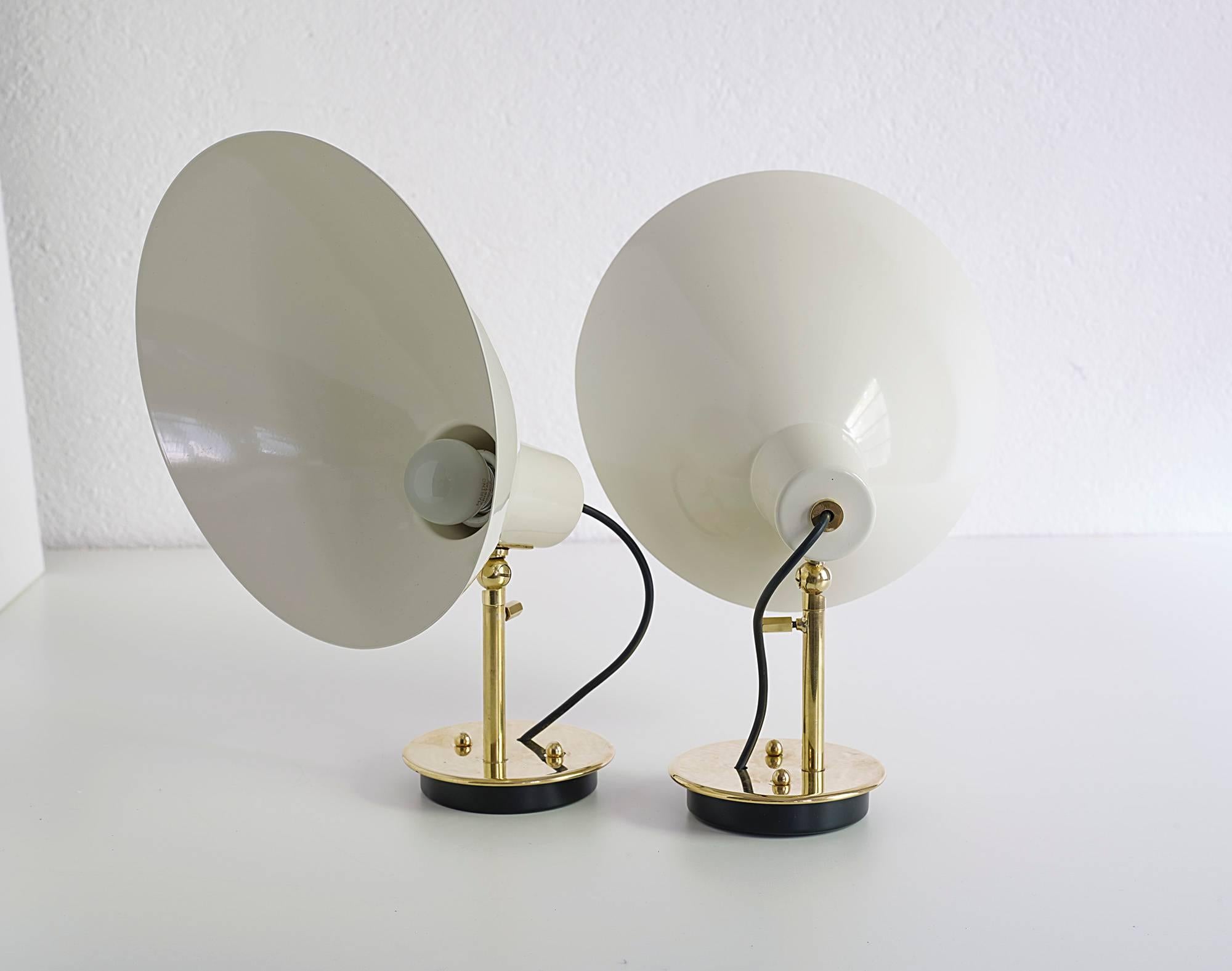 Great pair of model 2 sconces designed by Vittoriano Vigano for Arteluce, Italy, 1950. 

Brass, cream white lacquered shades.

These sconces are just marvelous, restored to perfect condition.