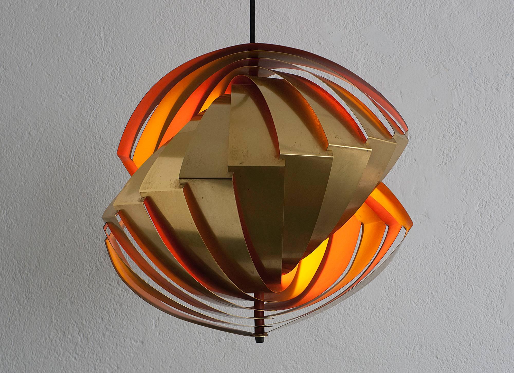 Beautiful brass pendant lamp designed by Danish architect Louis Weisdorf in 1963 and produced by Lyfa for a few years only because of high production costs.

High quality and ingenious design which stirs the imagination and provides an ever