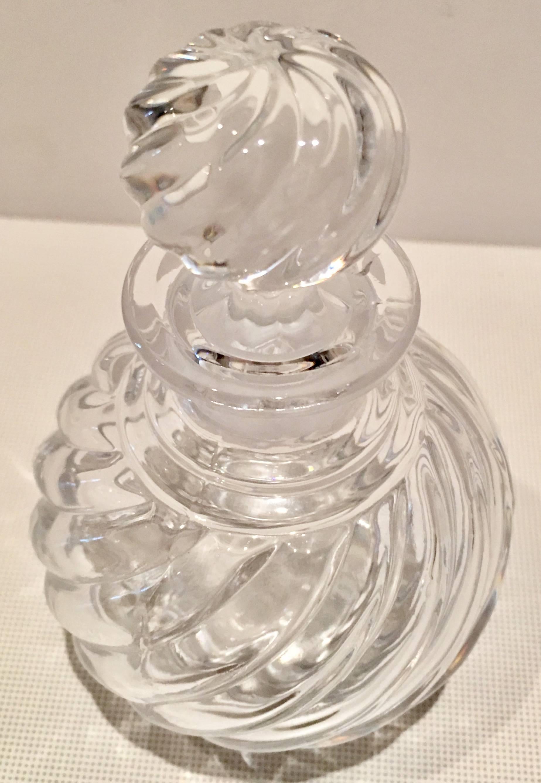 Vintage Baccarat France swirl pattern perfume decanter with stopper. Signed on the underside Baccarat France.
