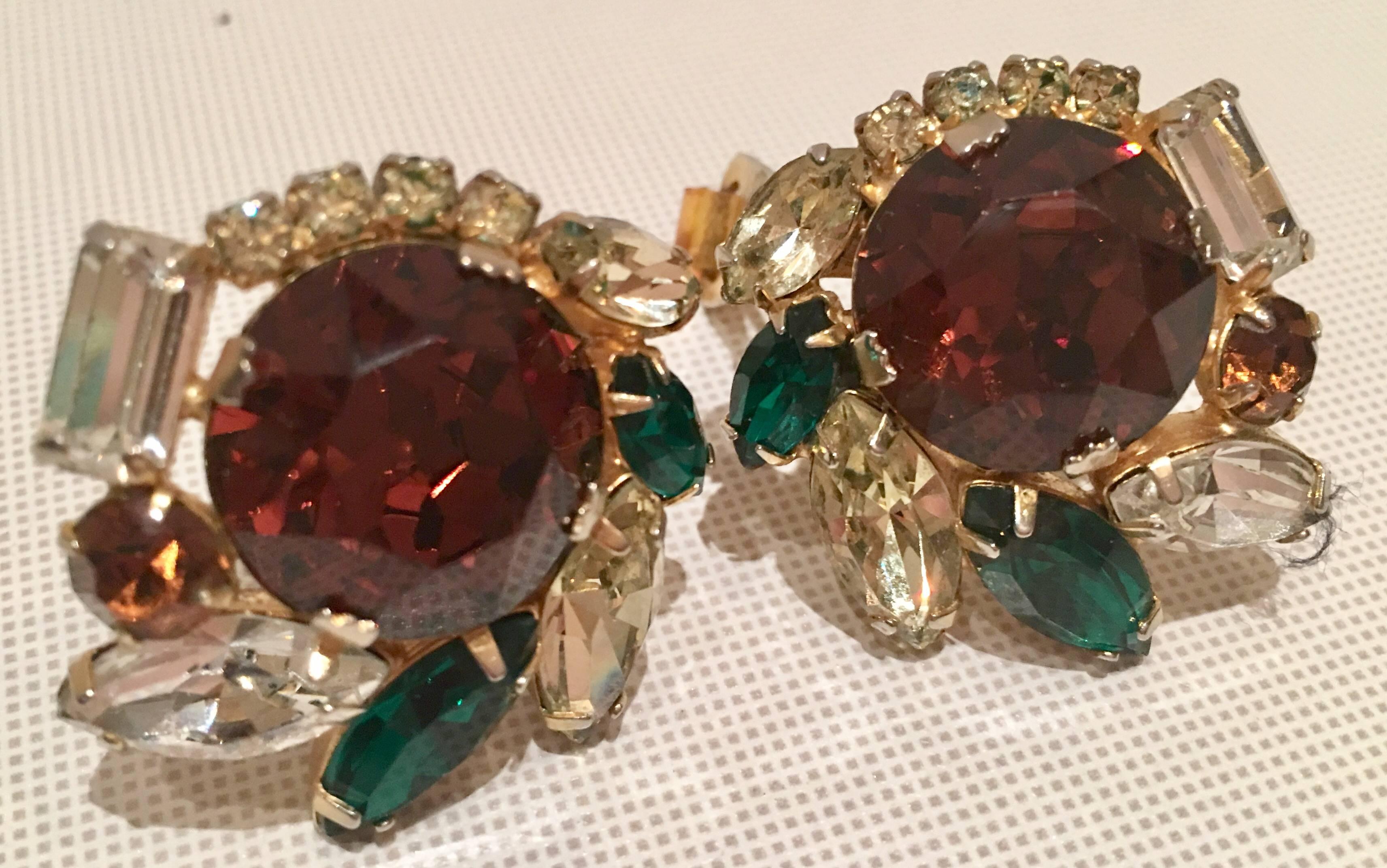 Sparkling Austrian cut crystal rhinestones prong set in gold plate clip style earrings singed, Hobe. Features citrine topaz large centre stone, surrounded by yellow diamond, emerald and clear crystal rhinestones.