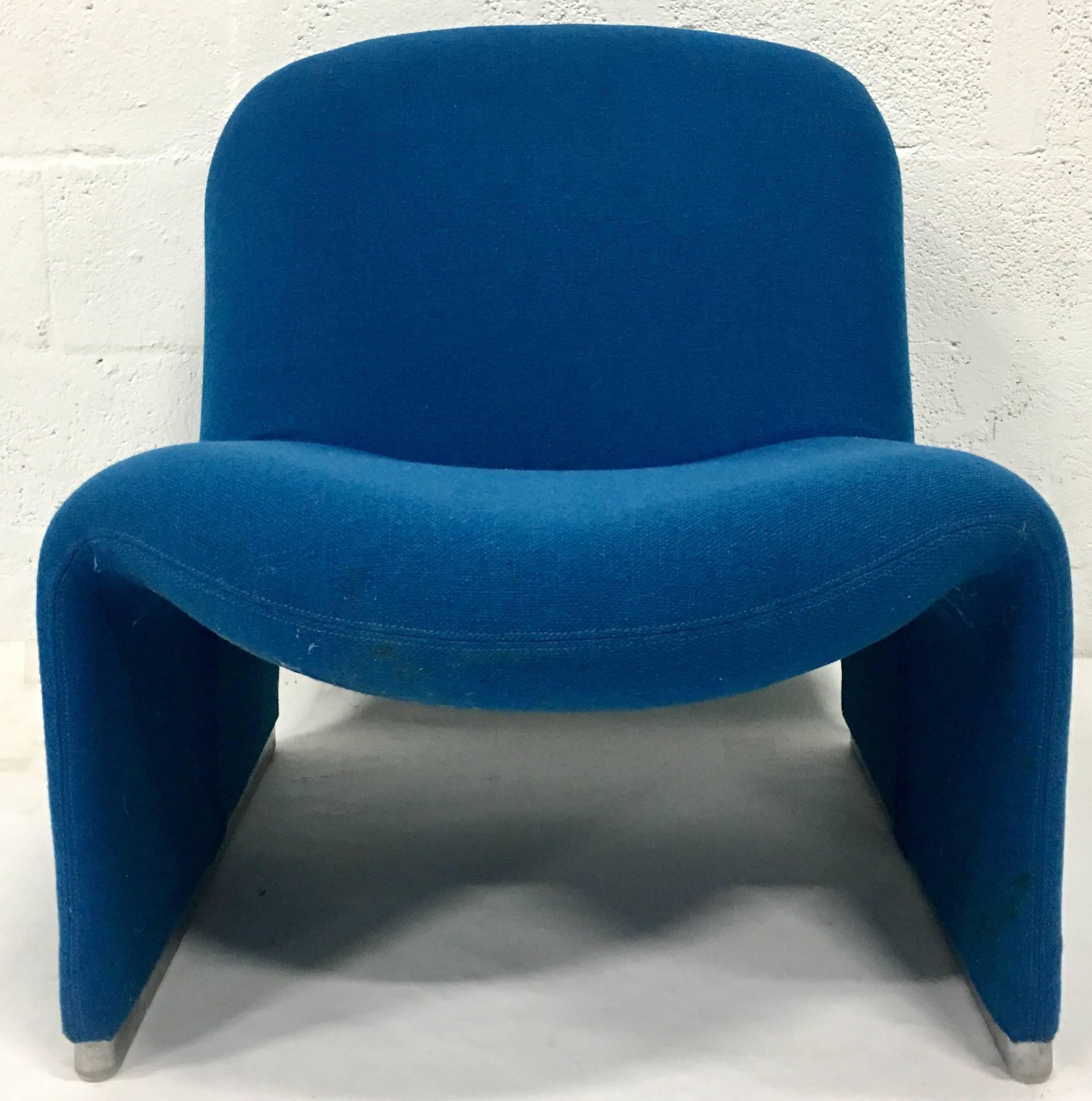 1970s Italian "Alky" chair by. Giancarlo Piretti for Castelli. Original electric blue
linen/wool blend fabric that is a extremely well fit slip cover. Zips from underneath for easy removal and cleaning. Stainless steel rounded edge base.