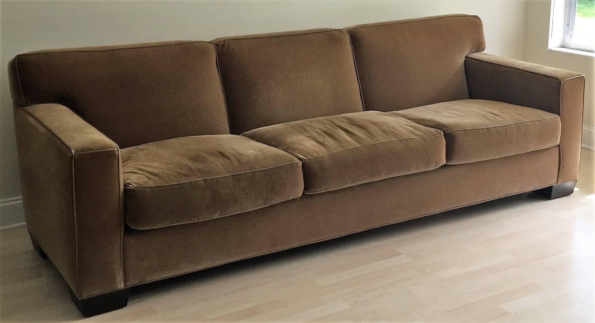20th century Jean Michael Frank style Art Deco mohair three-seat sofa in rich caramel color. Custom crafted kiln-dried hardwood and sinuous spring construction by ELI WYN of Chicago. Features classic T-back and tapered square wood stained feet.