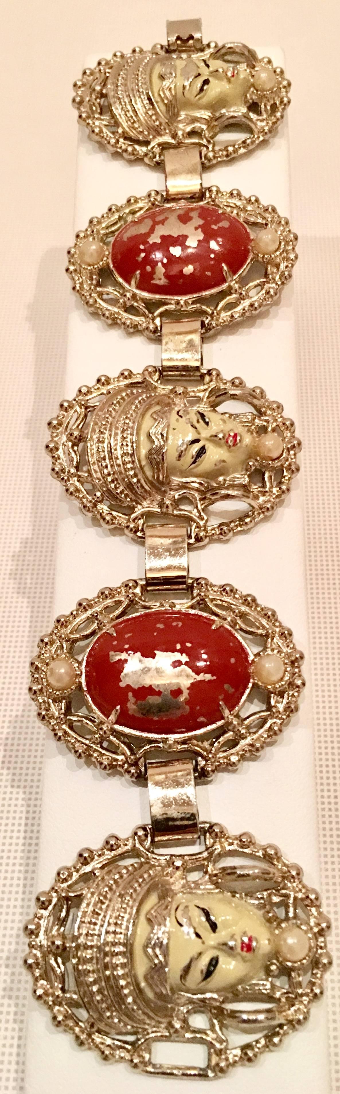 Mid-Century Selro style Asian Princess faux ivory and cinnabar gold plate five panel bracelet with a pair of ivory gold plate Asian Princess clip earrings. The Asian Princes collection is well know for being unsigned but no doubt identifiable as
