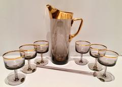 Mid-Century Smoked Amethyst Crystal and 22-Karat Gold Drinks Set of Eight