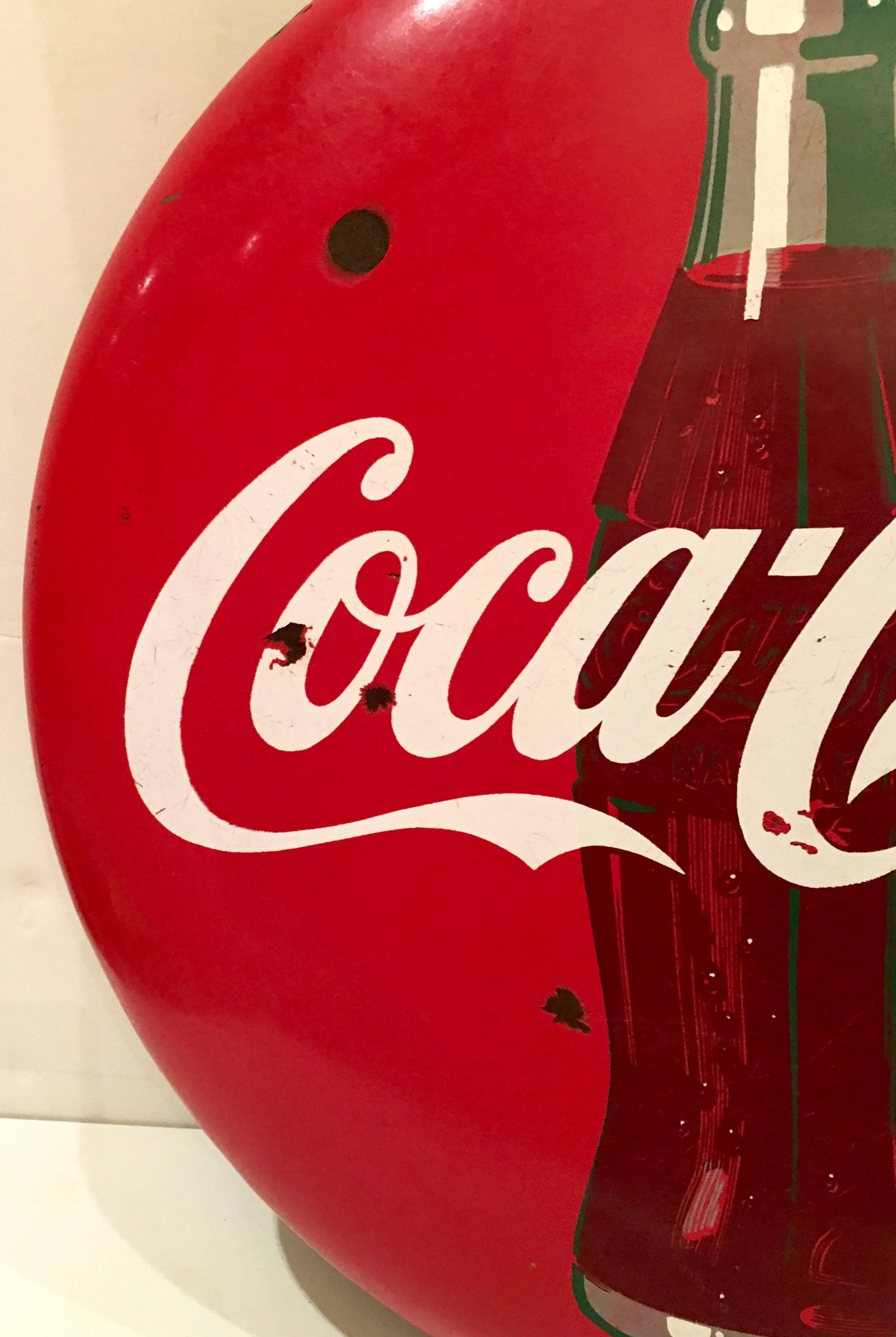 coca cola button sign
