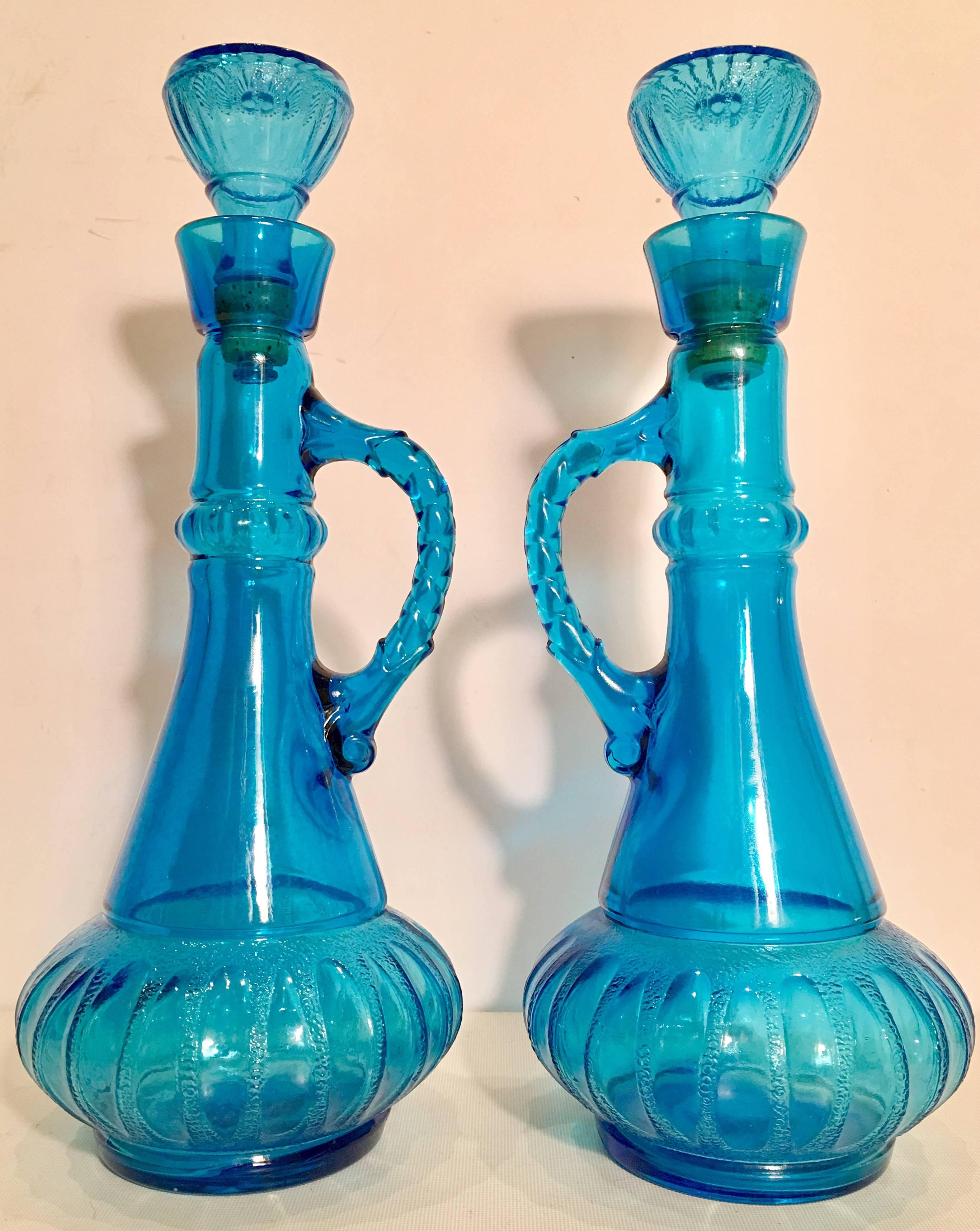 Pair of azure blue cut-glass 