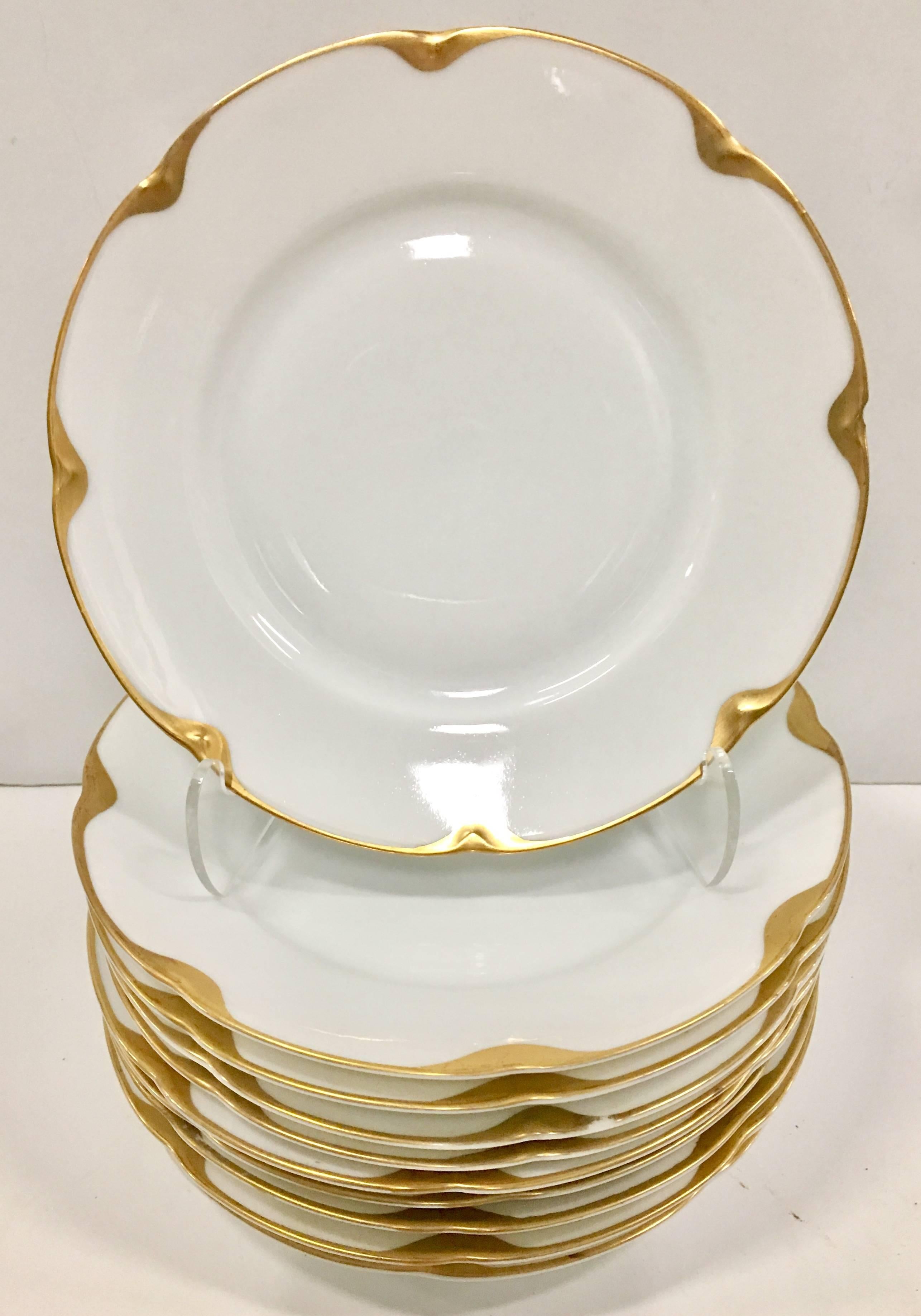 Rare Royal Epiag bright white porcelain with 18-karat gold hand-painted scallop edge detail dinnerware set of 23 pieces in "Veragold". Veragold is identical and almost impossible to discern from the same pattern by a different name made by