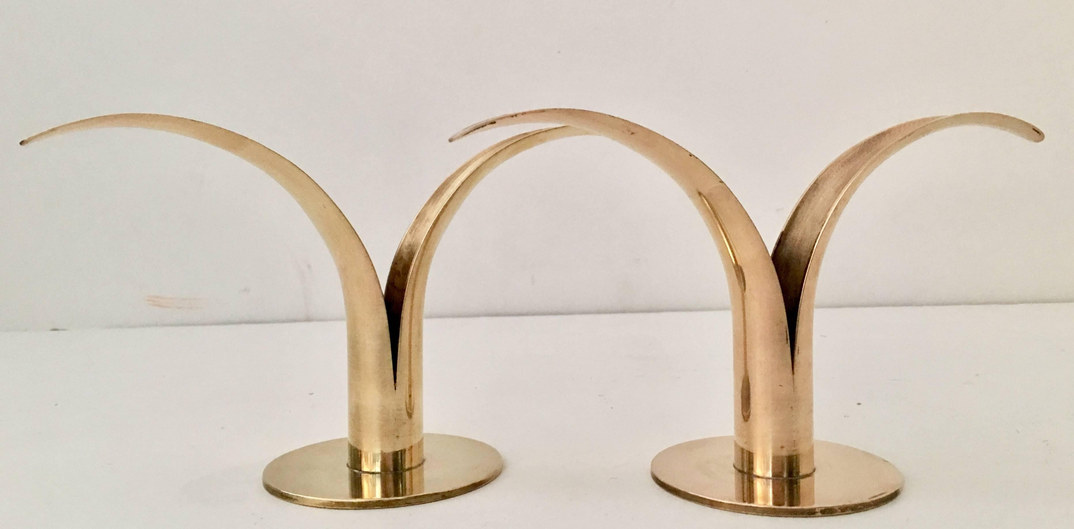 Swedish pair of solid brass Mid-Century Modern "Lily" candlestick holders.
Both are signed on the underside, Ystad-Metall. Made in Sweden.