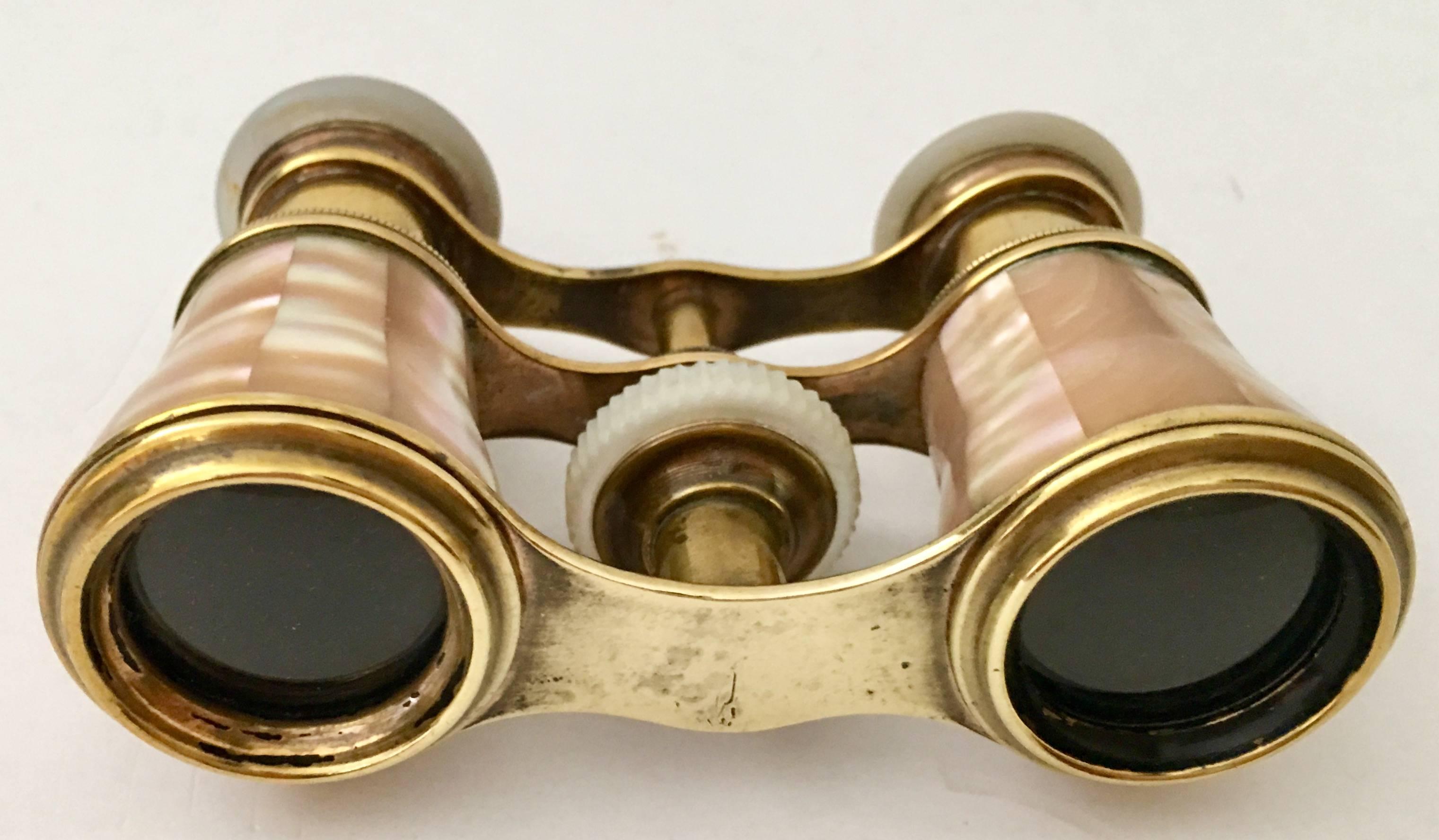 Fantastic solid brass and mother-of-pearl opera glasses-binoculars By, Lamaer Paris. The original shagreen velvet lined protective storage case in included. Each lens is signed Lamaer Paris. Optics are in full working order. Height when not in use,