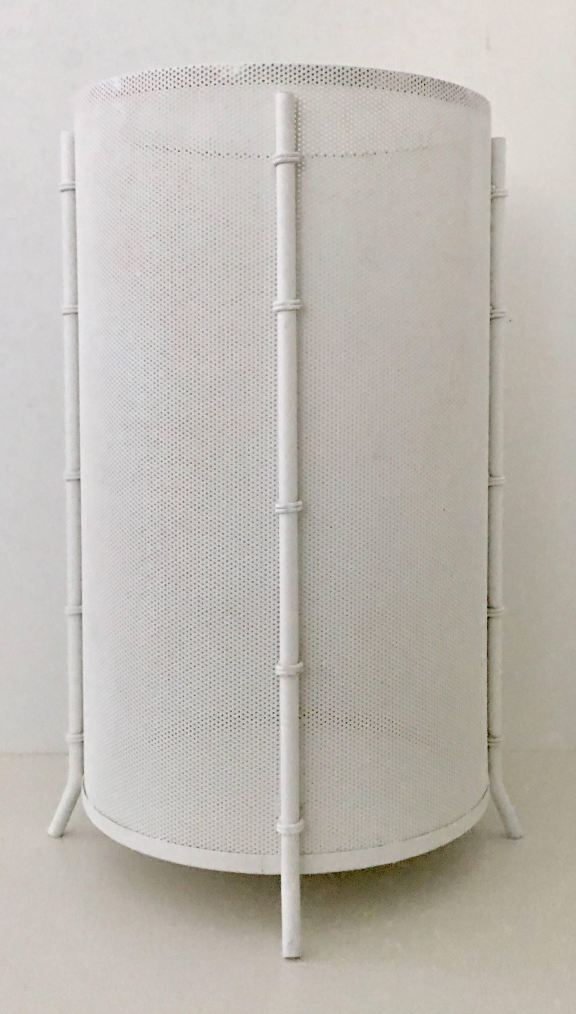 Extremely rare Mid-Century metal mesh umbrella stand with faux bamboo detail and legs. Designed by Mathieu Matégot - France. Painted white perforated wrought iron, metal mesh.