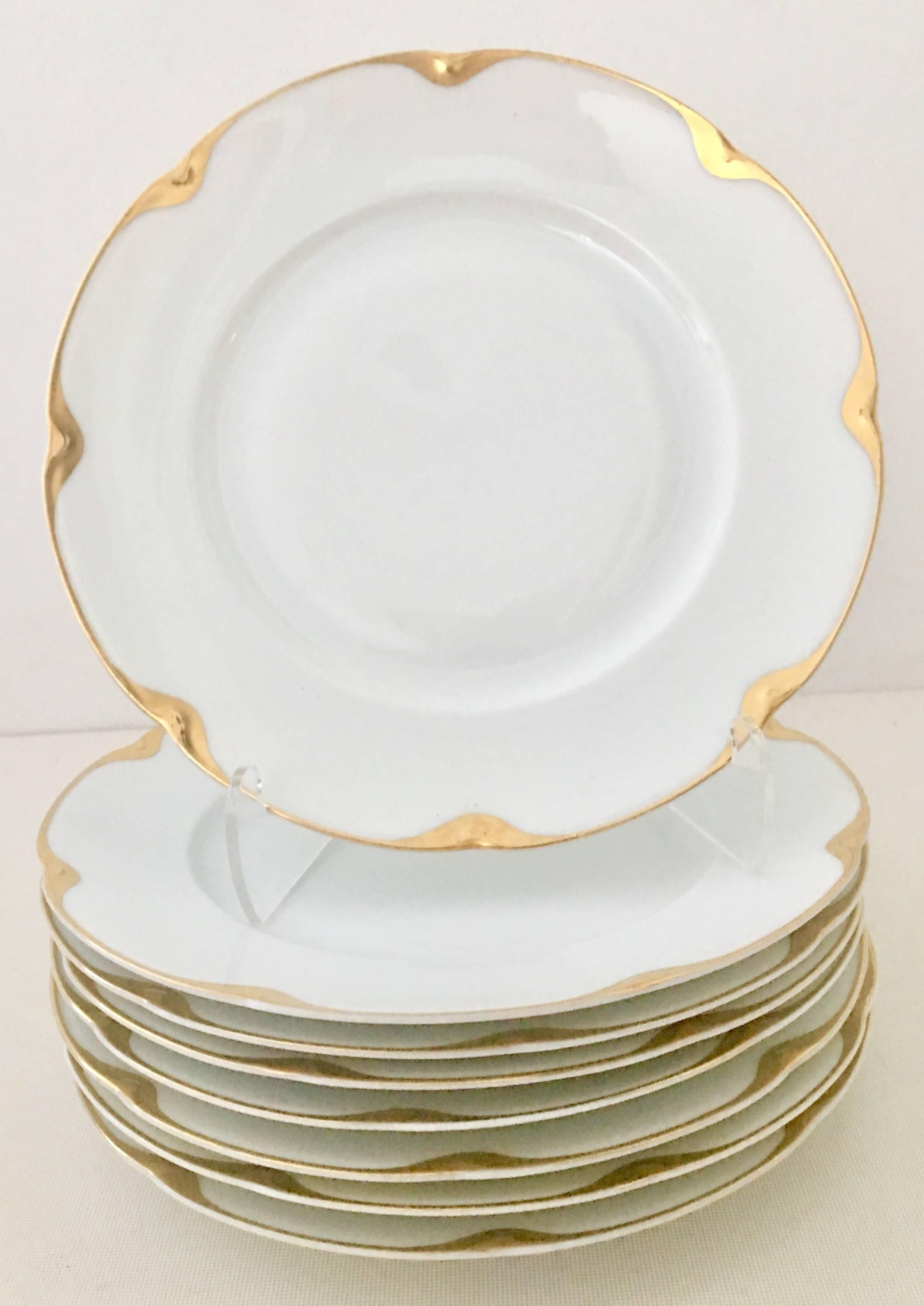 Rare, Royal Epiag bright white porcelain with 18-karat gold hand-painted scallop edge detail dinnerware set of 31 pieces in 