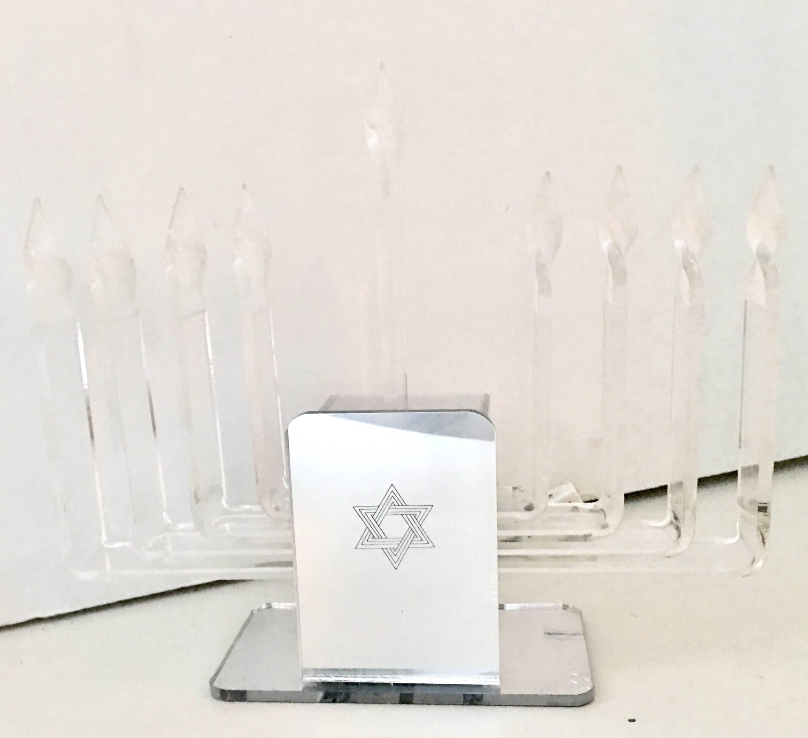 1970'S MOD Lucite mirrored nine-light Judaica electrified and adjustable Hanukkah Menorah
This menorah features the nine candle lights of Hanukkah, each one has the ability to light adjust separately or all at once for each night of Hanukkah. The