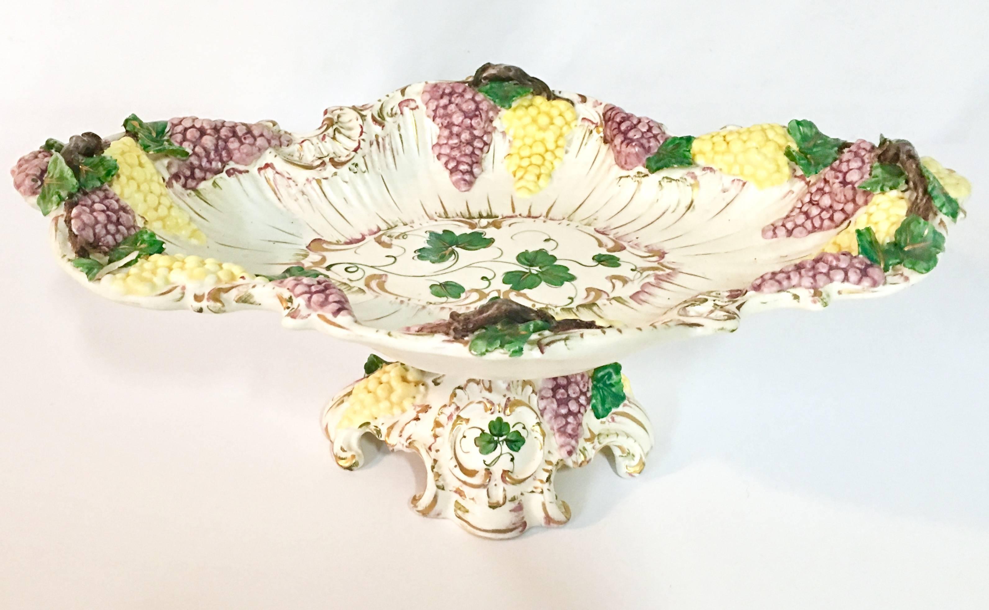 Midcentury Italian hand-painted Capodimonte grape bunch motif with 22-karat detail center bowl. Signed on the underside, 