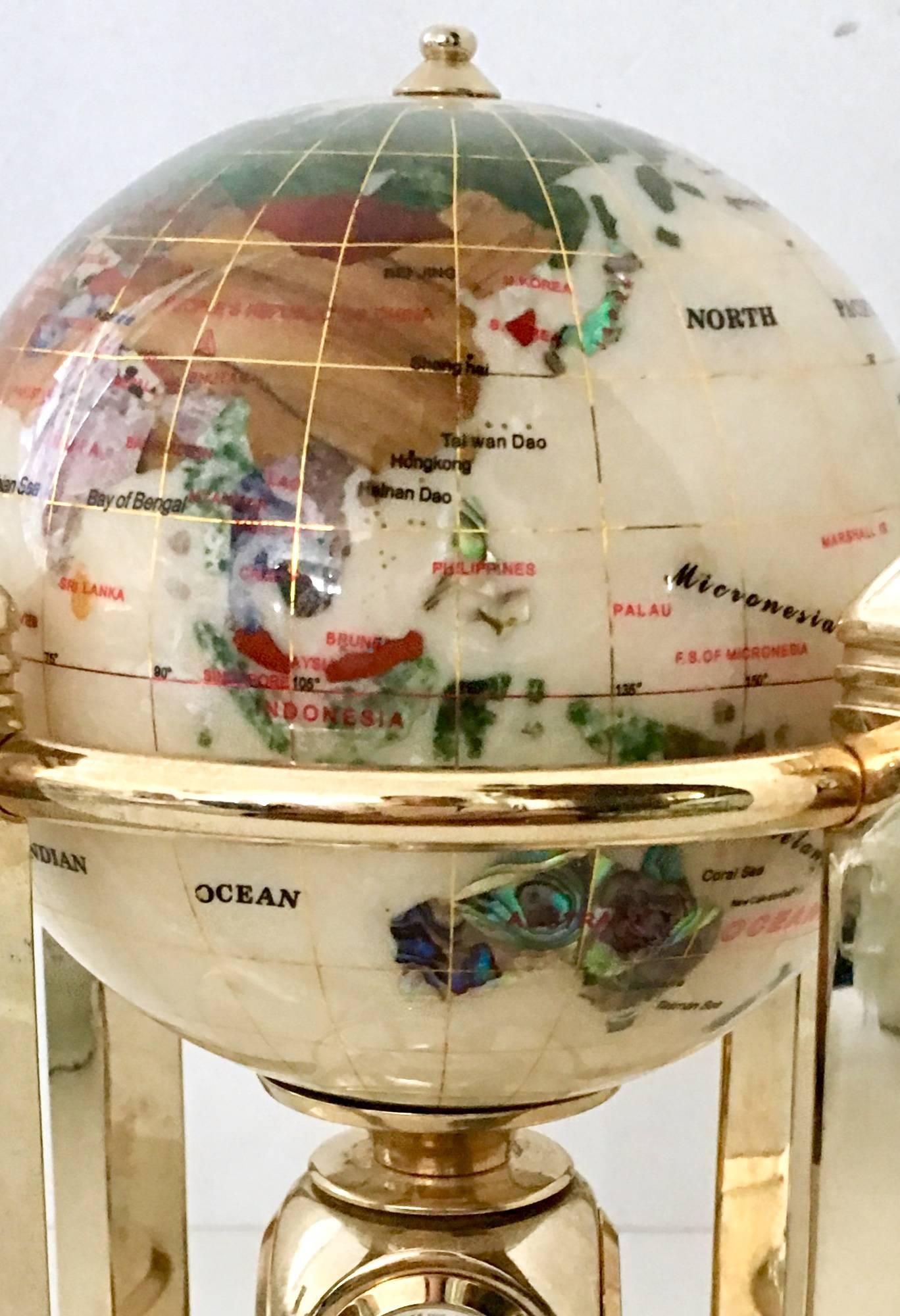 globe with stone inlay