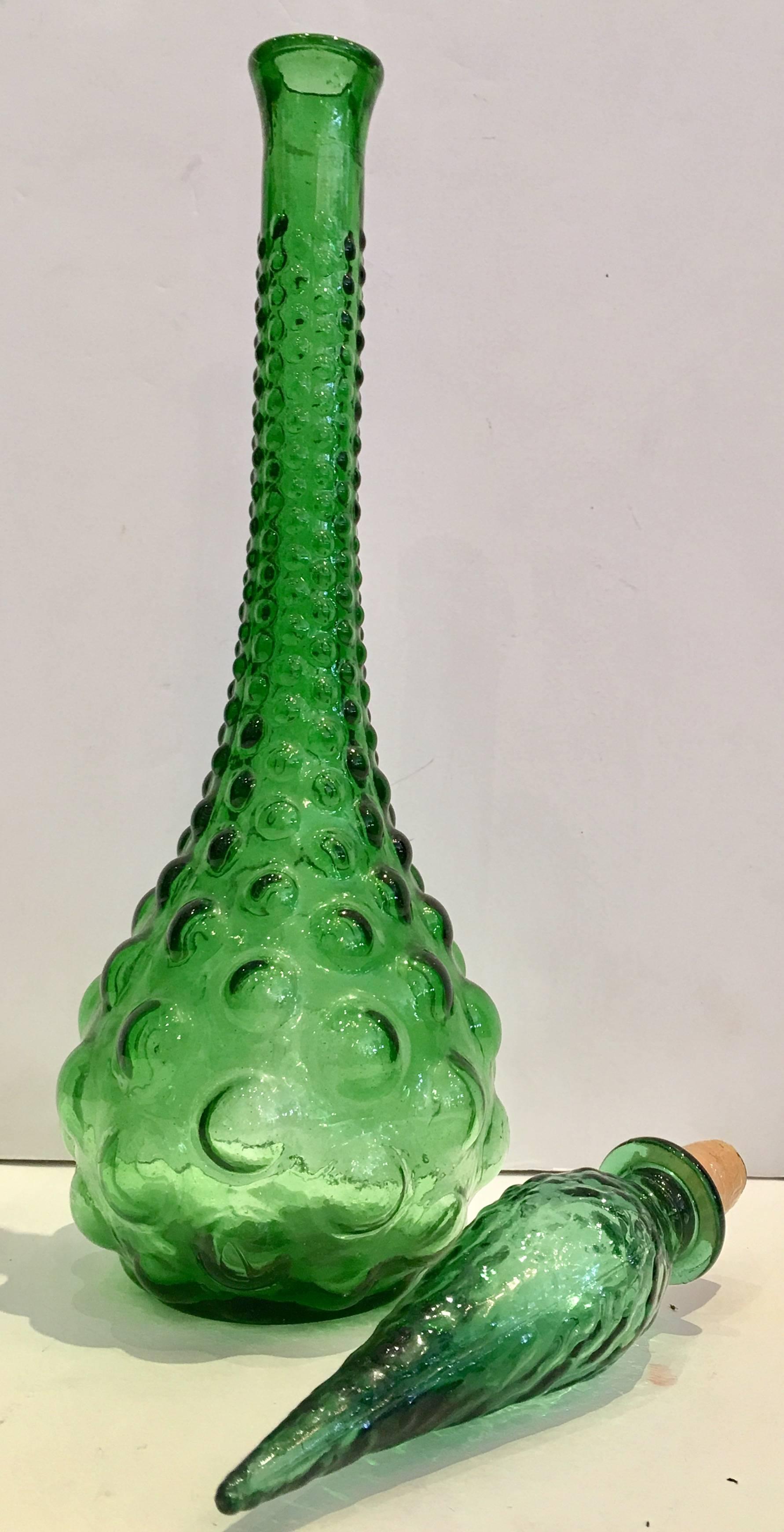 Mid-Century Italian blown art glass bubble Empoli decanter with stopper. This emerald green textured and raised decanter has a pointy 