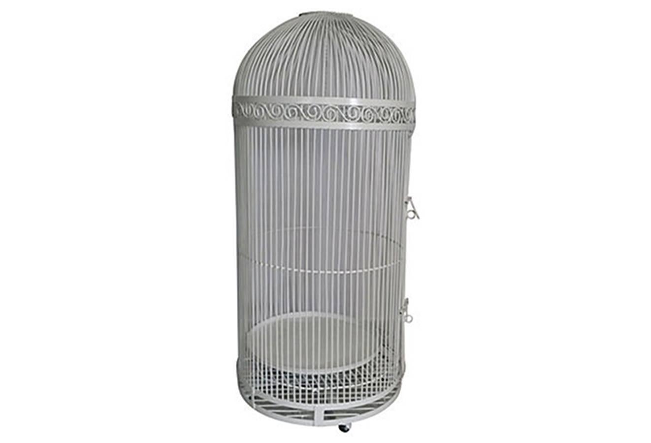 American wrought iron birdcage, circa 1870. Newly painted bright white powder coat for indoor and outdoor use. Scroll design at the top, one door, and a tray at the bottom. Includes interior chair and hanging perch. Sits on four casters. Stands 5.5'.