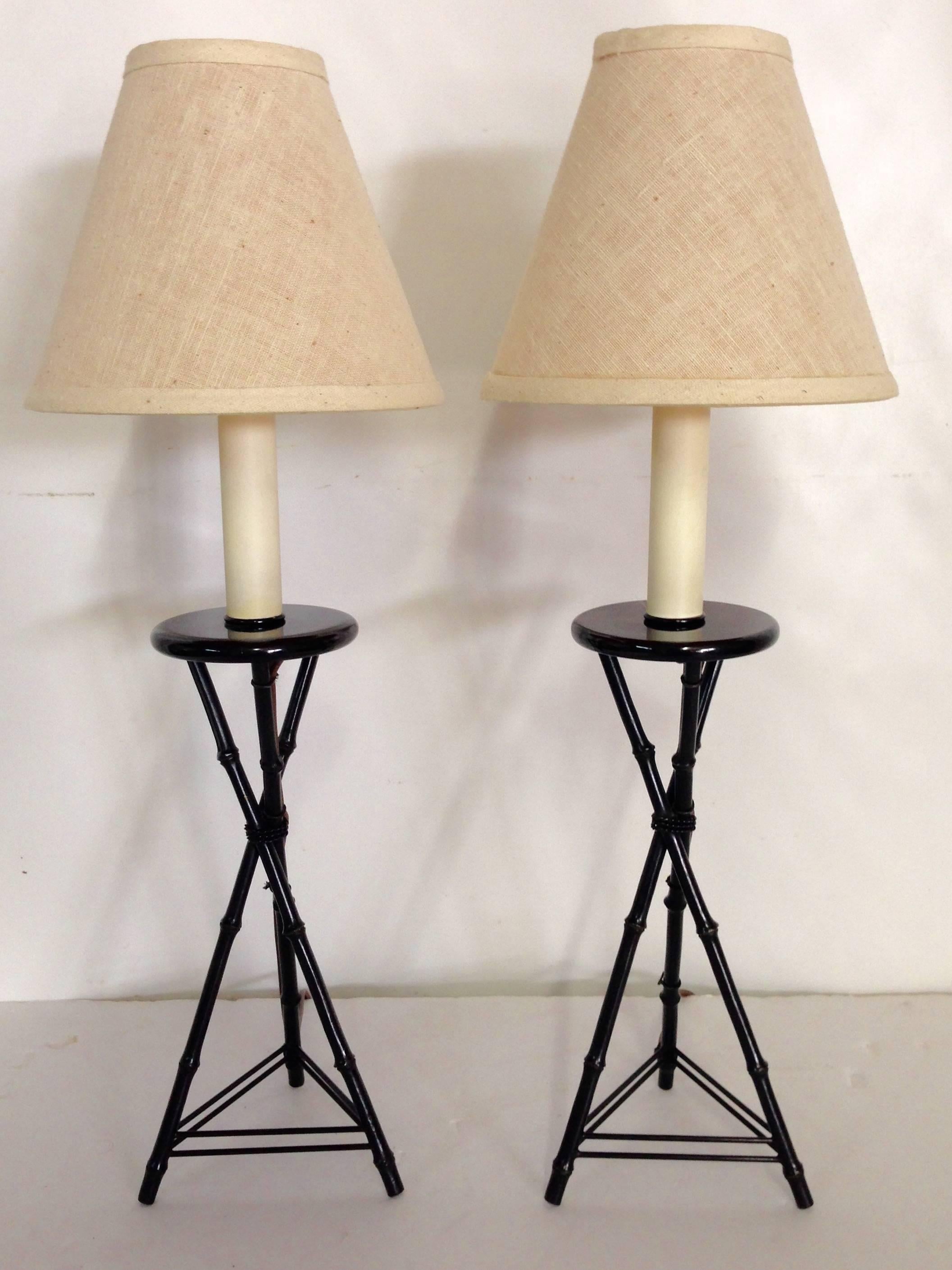 Frederick Cooper tripod bamboo-style table lamps with shades. Tripod bases are a high-gloss black finish and made of metal. Wired for the US and in working order. Original natural-colored linen shades, 6