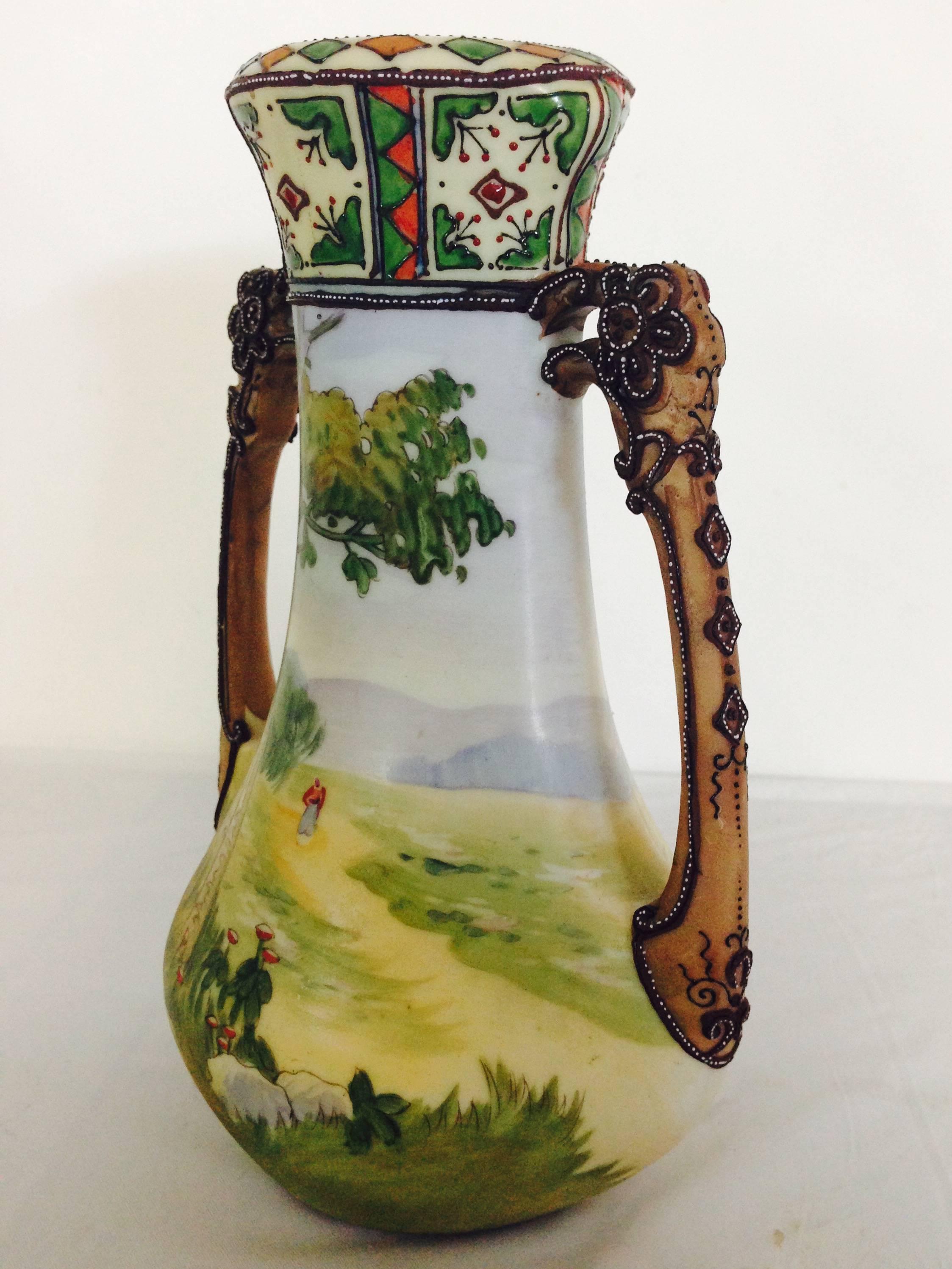 Antique and very rare Art Nouveau design, double dragon handle pasture and mountain scene vase. Heavy raised dot moriage detail on handles and neck. Signed on the underside with M for Morimura Bros. and green wreath.