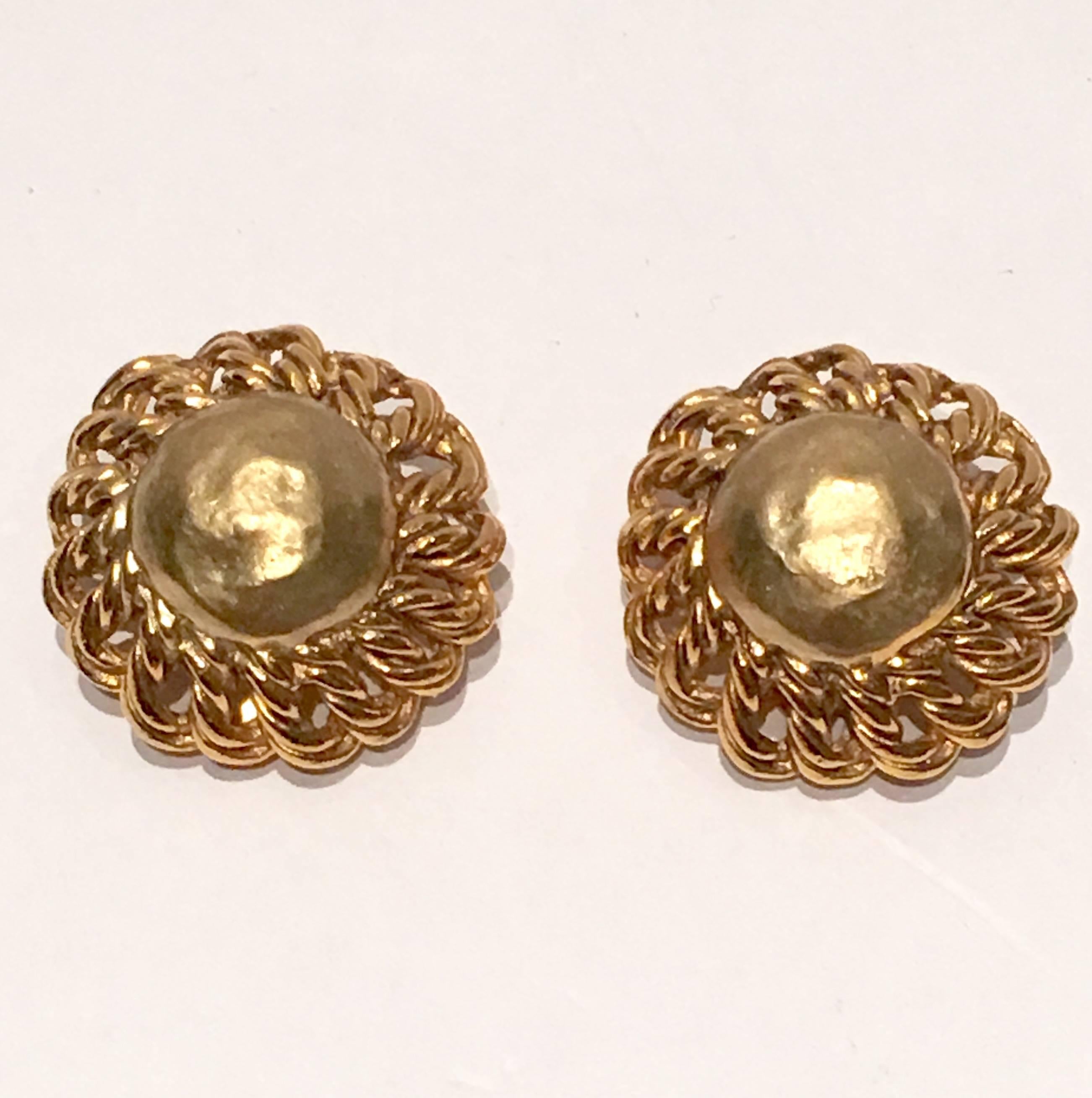 Great pair of Chanel gold plate round hammered dome and chain surround clip style earrings. Each earring is signed on the underside, CHANEL.
