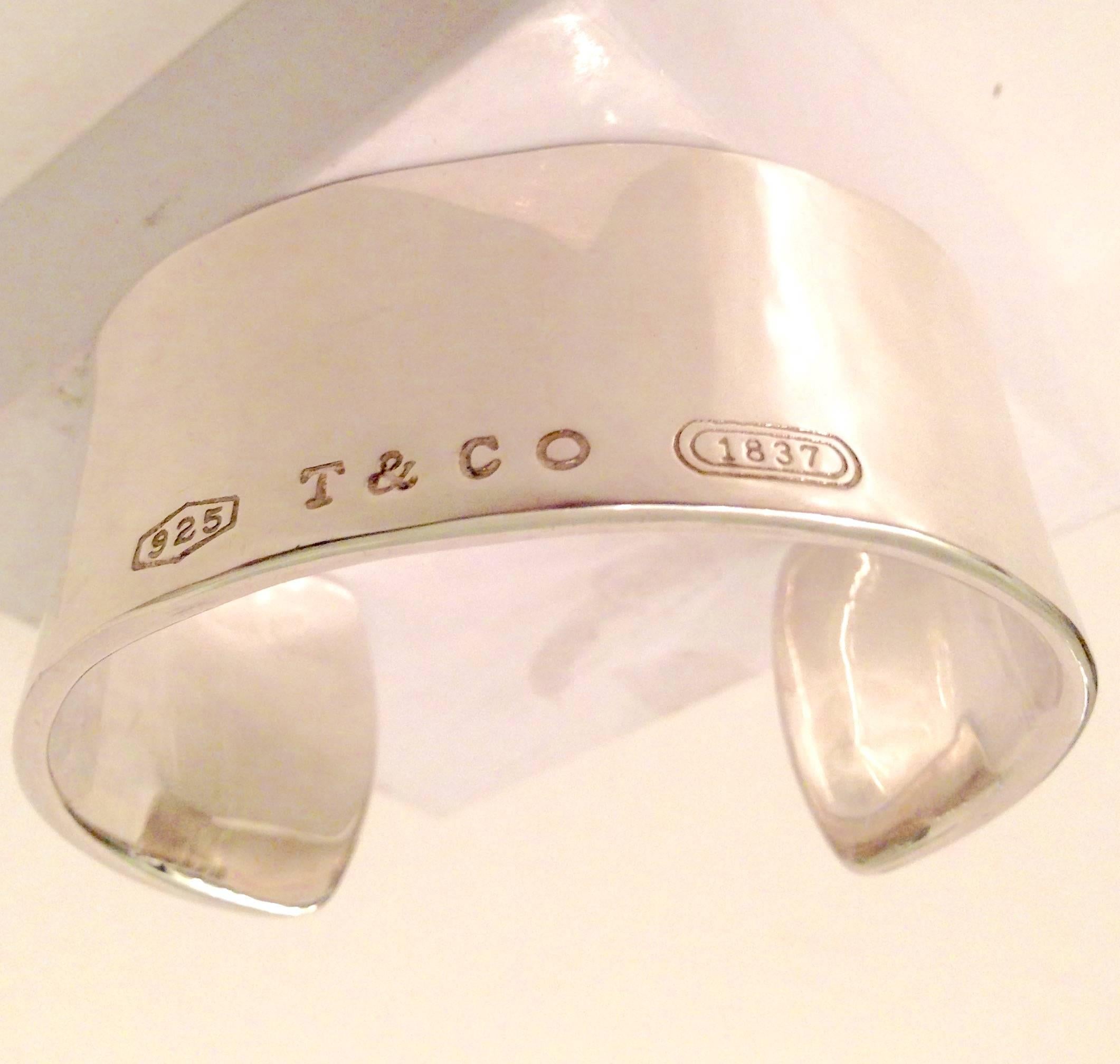 925 Sterling Silver Tiffany wide cuff in excellent condition. Weighs 82.2g. Signed 