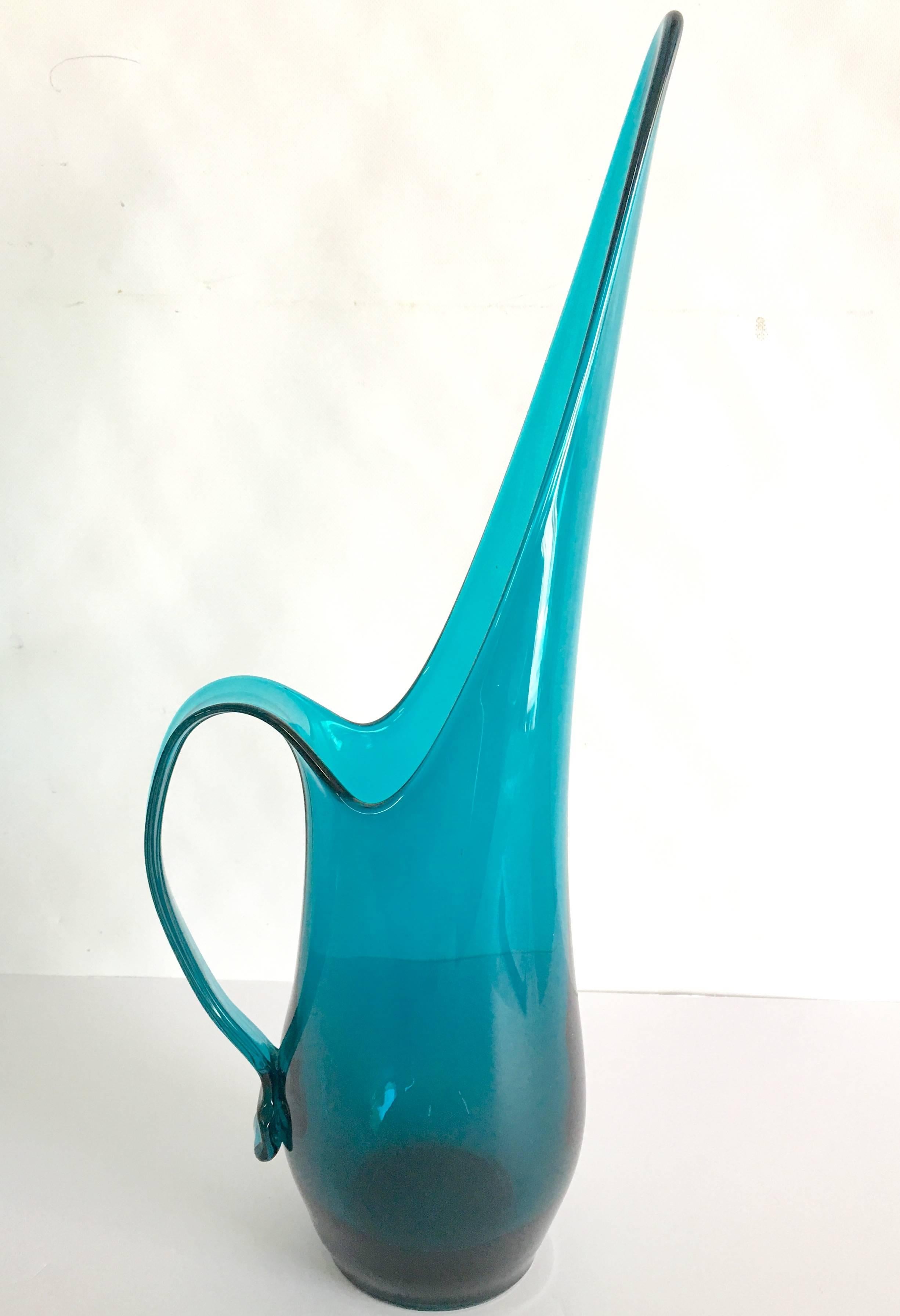 Swedish style Mid-Century Modern blue blown glass slag glass handled pitcher.