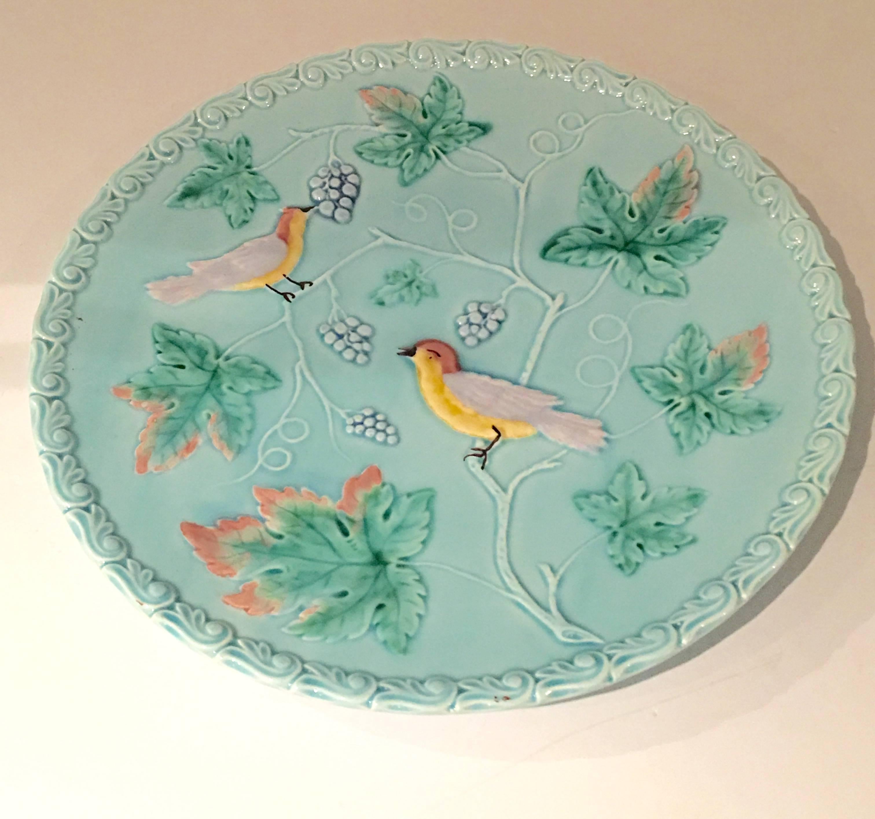 Turquoise West Germany raised bird and vine motif round platter. Signed on the underside, Made In West Germany, 230 11 Z.