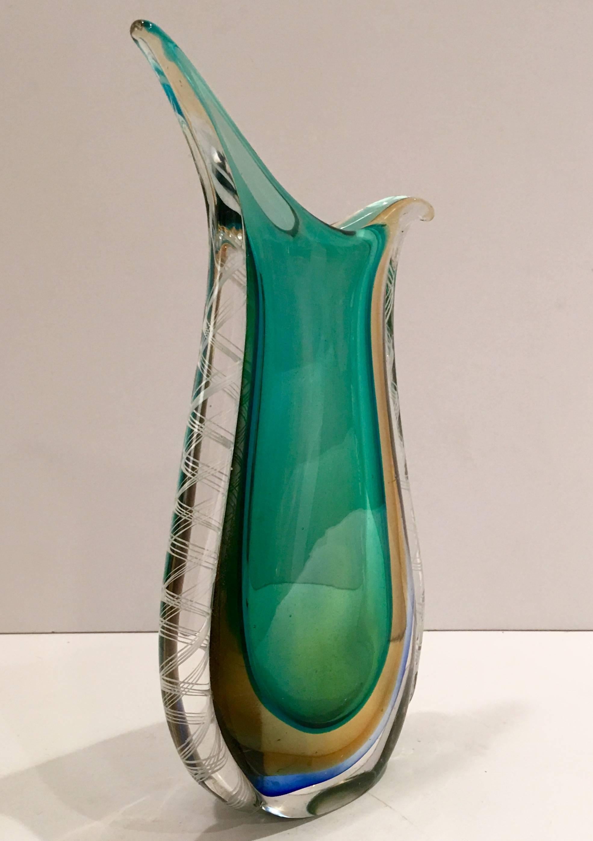 1970s Flavio Poli style Italian rare Murano glass Sommerso four color case glass vase in emerald green, gold, cobalt blue and clear with white lattice side detail and double flair opening.
