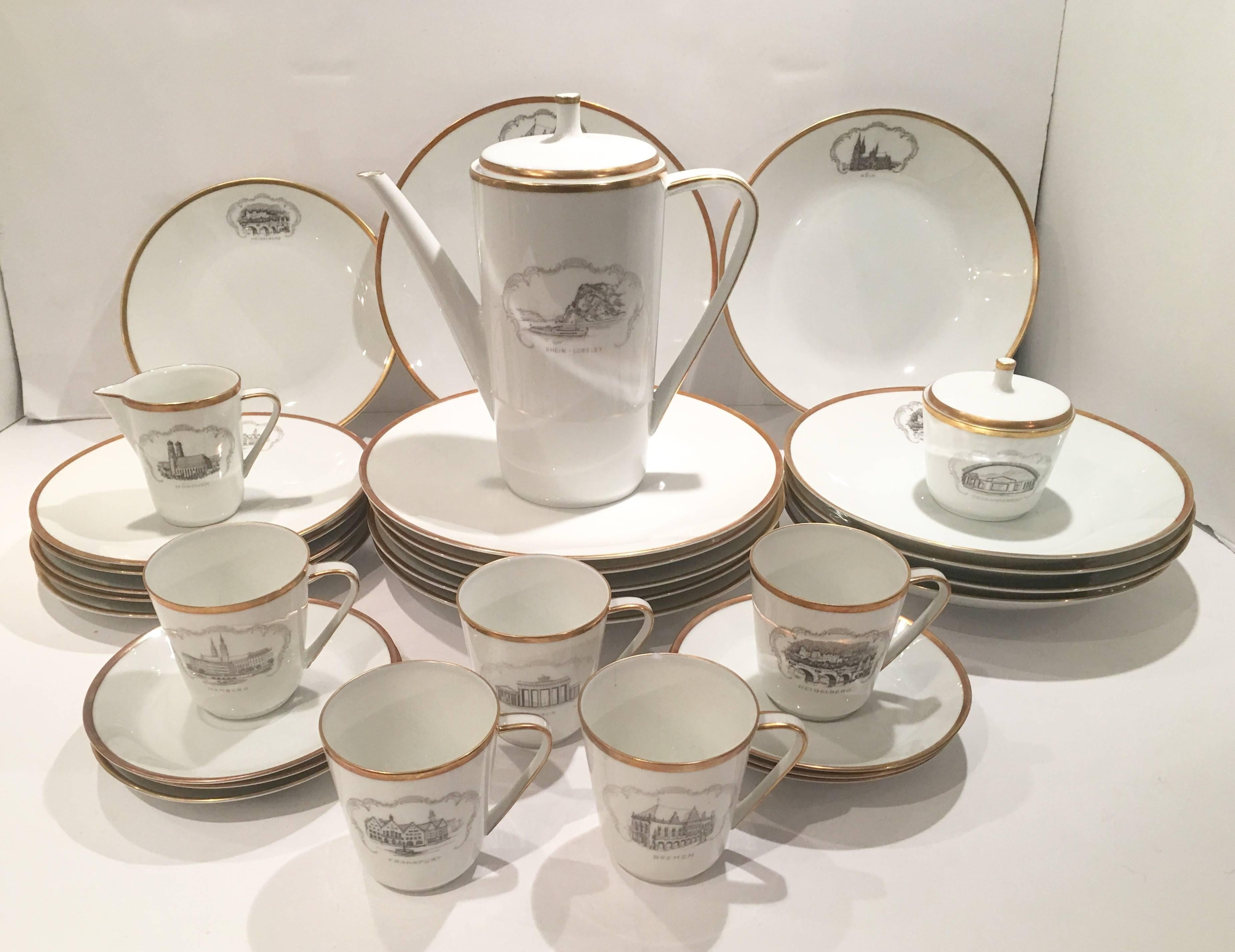 Art Deco style Hapag-Lloyd Germany fine white porcelain with a 22-karat gold edge rim shipping line 33-piece set. This is a commemorative pattern that was designed and produced in 1969 to mark the merging of the Hamburg American and North German