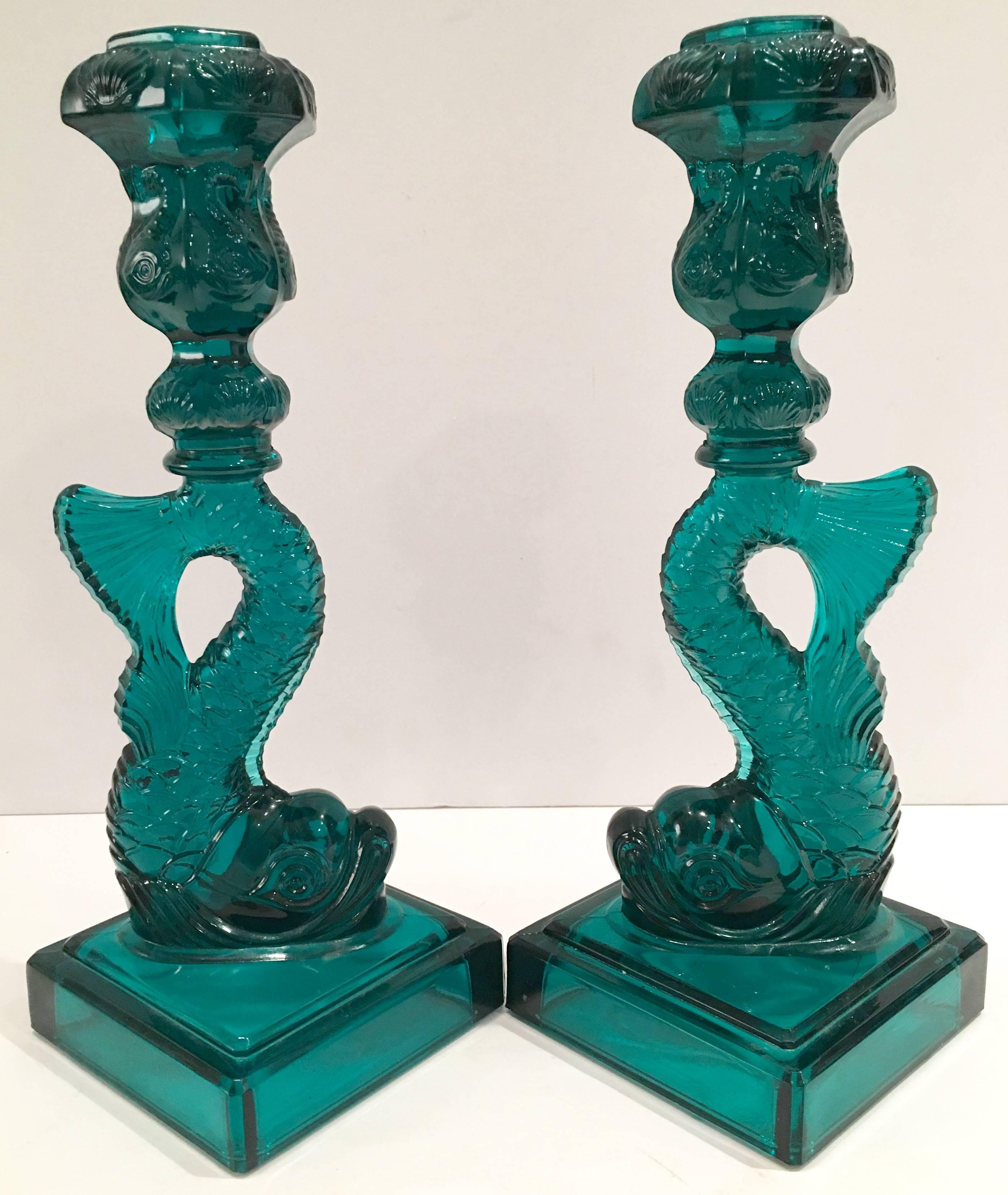 Coveted green American cut glass sculptural Koi fish candlesticks signed, MMA. These lovely emerald green glass candlesticks were reproduced in the 1970s by Imperial Glass Company for the Metropolitan Museum Of Art as a limited edition. Each