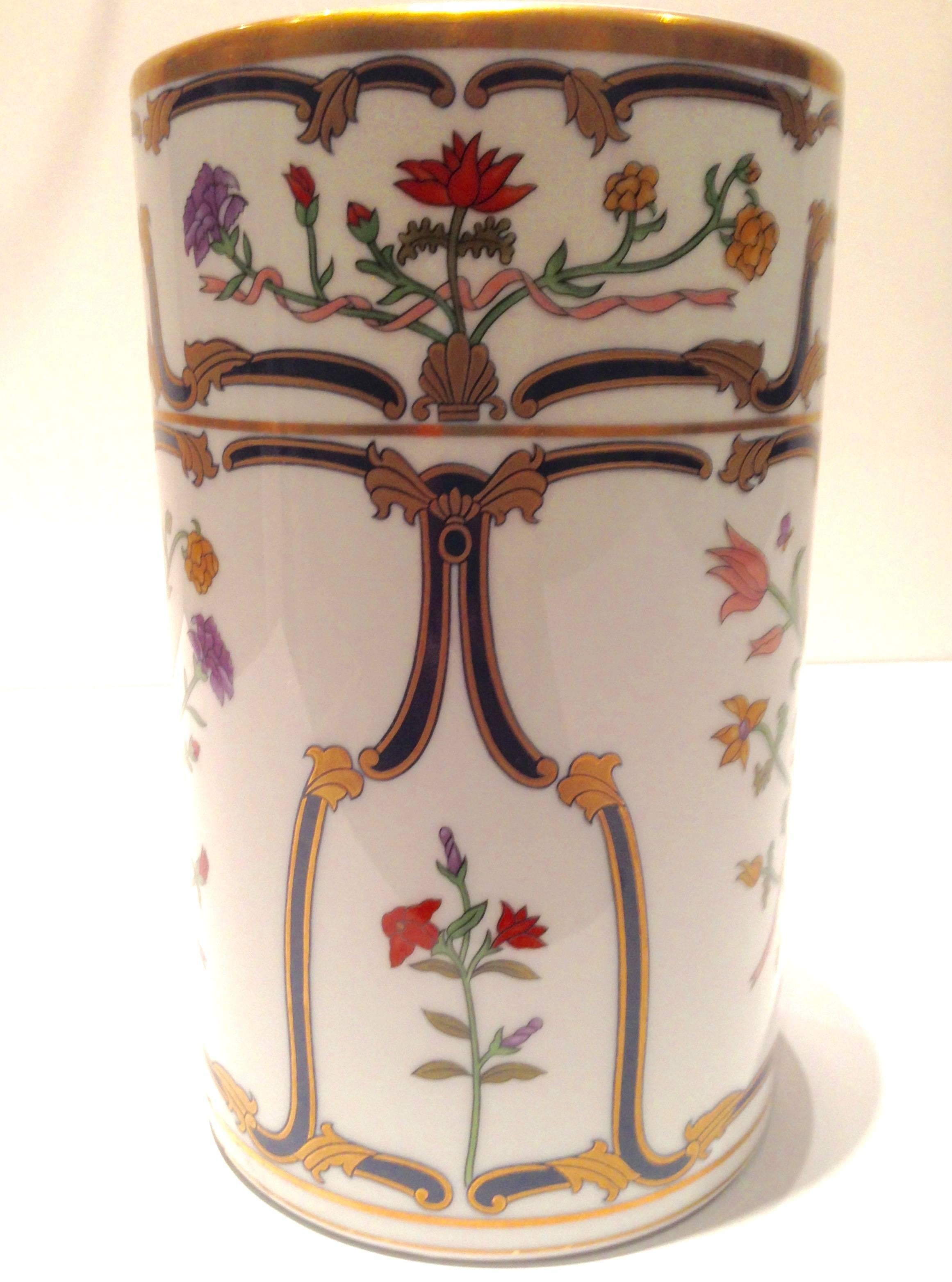Christian Dior porcelain floral motif vase in the Renaissance pattern with gold detail on rim. Signed 
