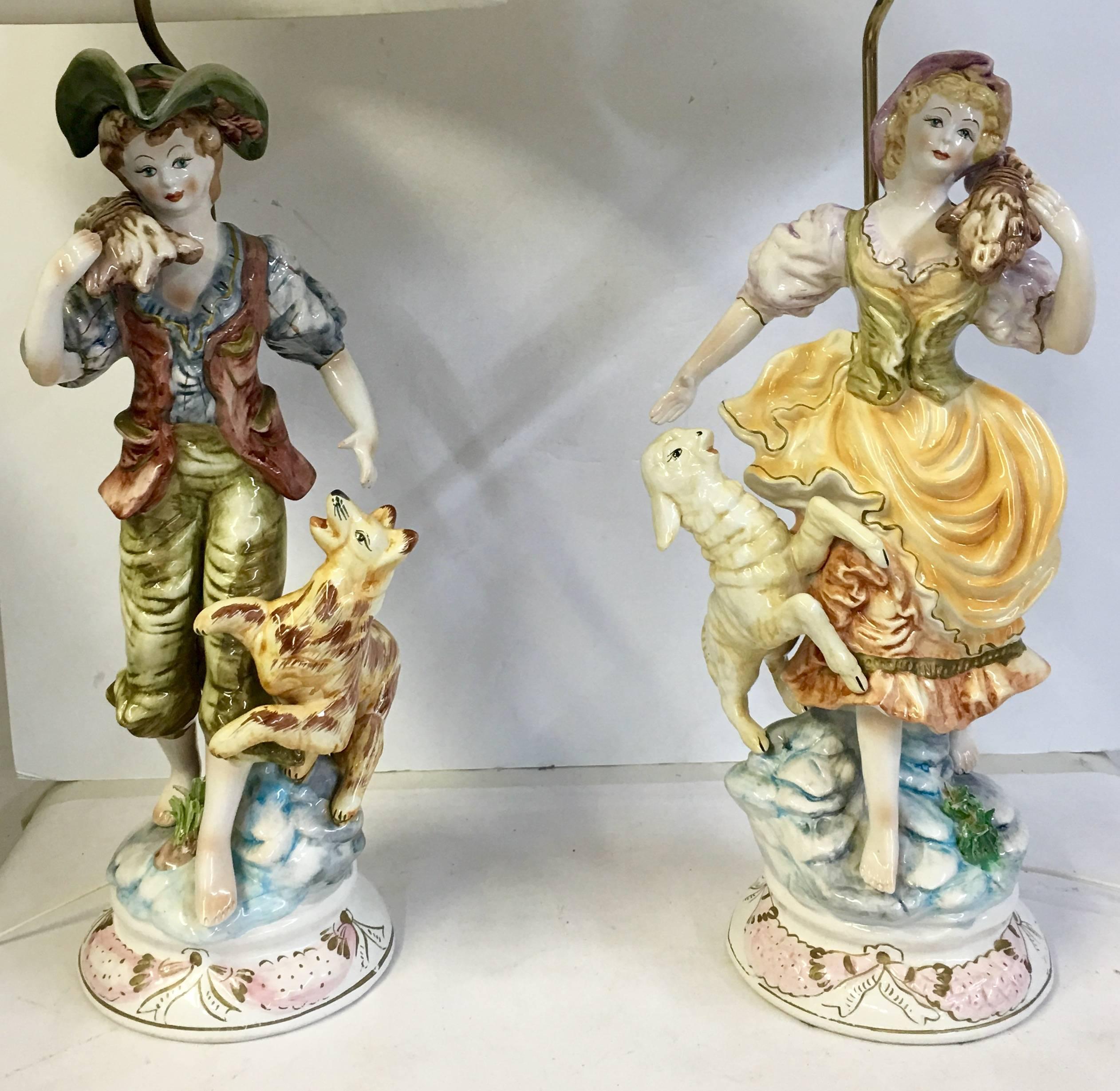 Mid-Century Italian Capodimonte Hand Painted Porcelain Pair of Tall Country Boy & Girl Table Lamps. This rare and exquisitely executed hand painted country or peasant boy and girl lamps are each signed underside with the makers mark of a 