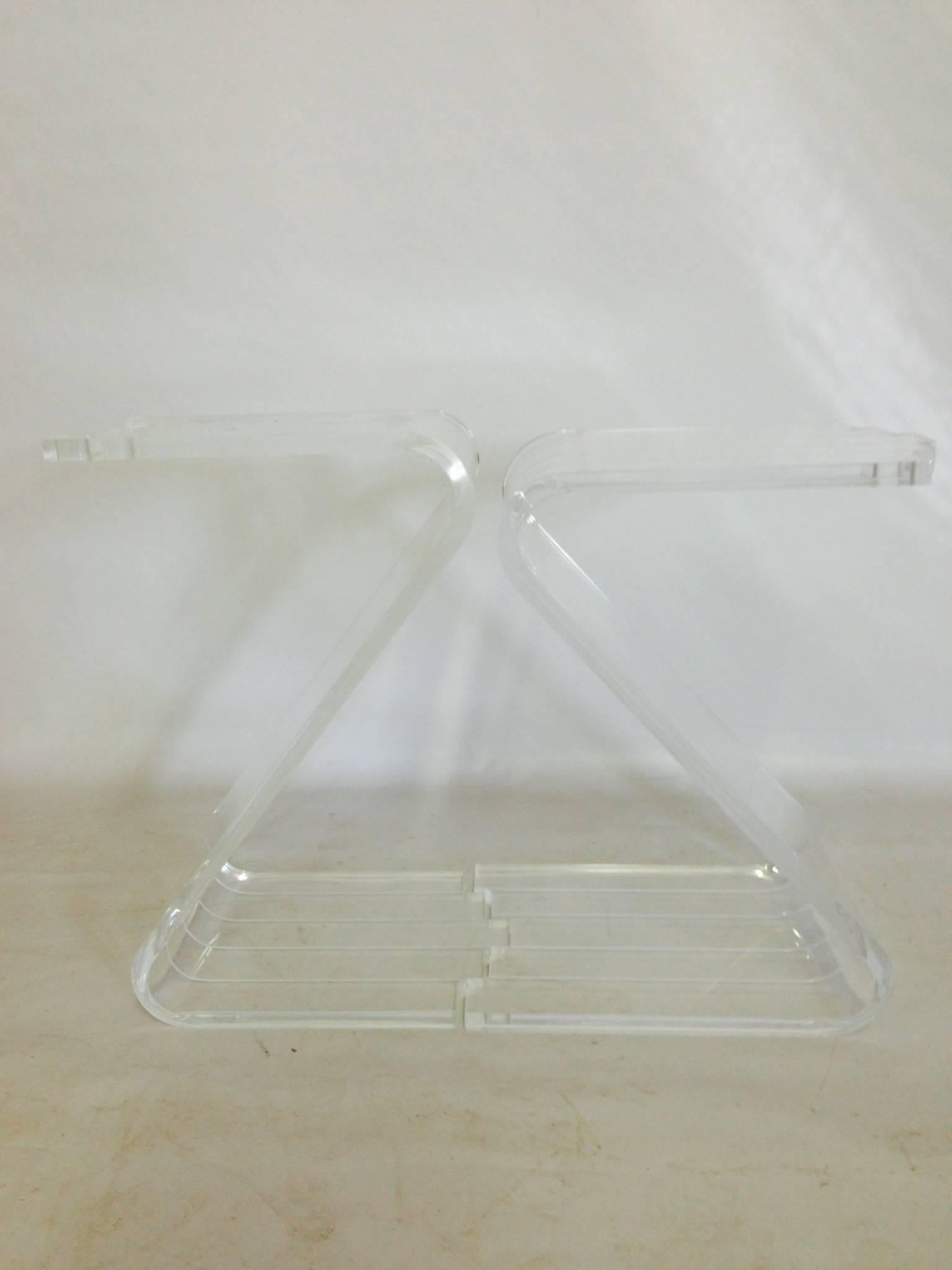 Rare pair of Lucite grooved "Z" form puzzle piece side or end table pair, 1970s. Zigzag bottom detail that allows connection at the base. These tables intentionally vary in height slightly. The smaller one is 20.5" inches in