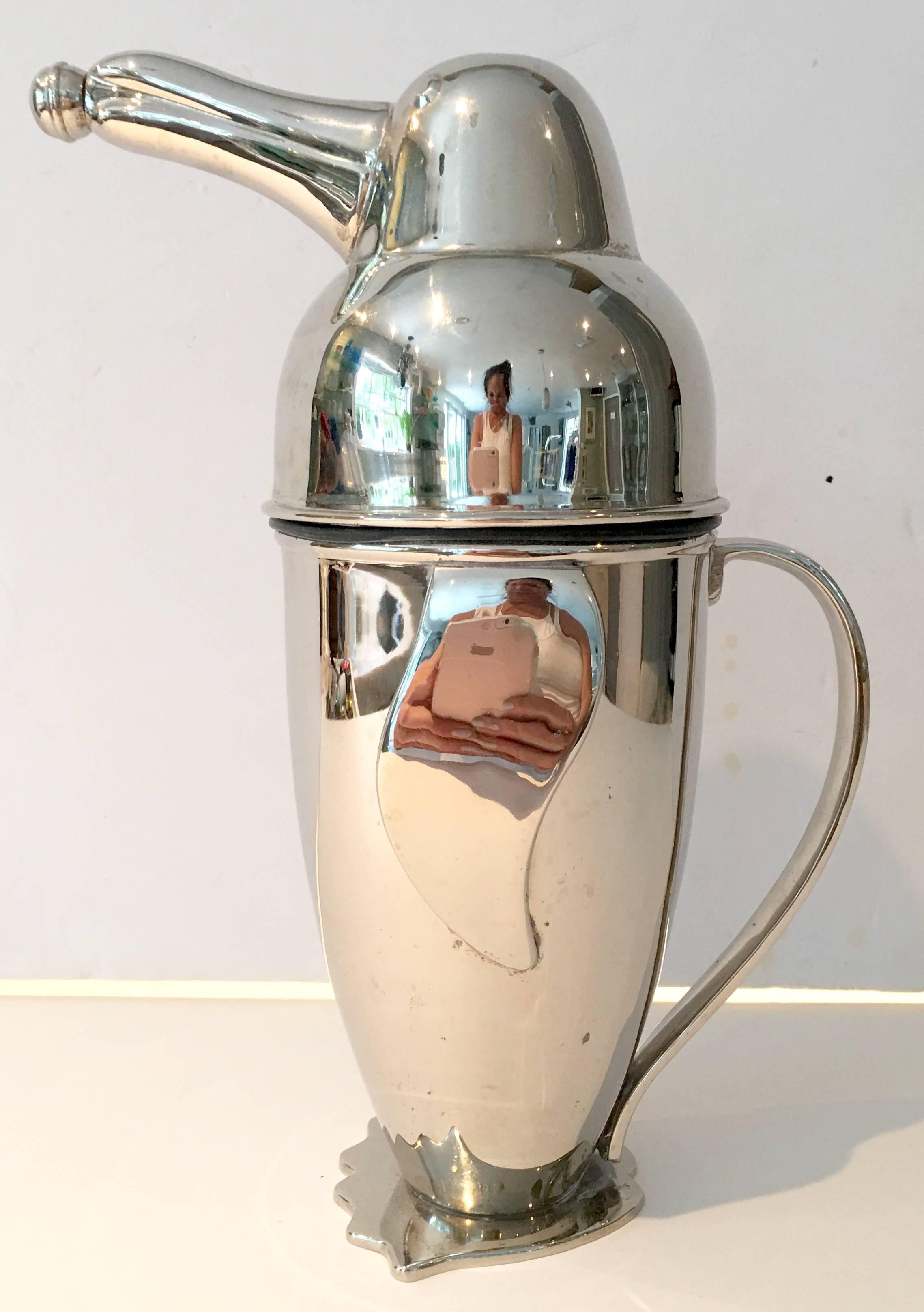 Adorable vintage over sized penguin form large three-piece silver plate cocktail shaker.