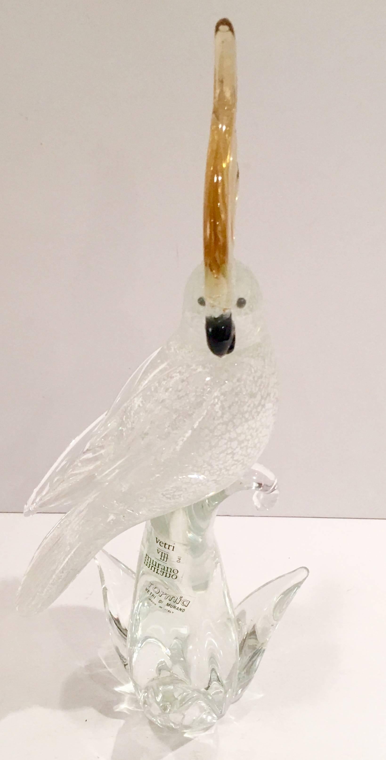 Vintage large Murano Glass Sommerso silver inclusion Cockatoo perching sculpture by, Formia Vetri Di Murano. This sculpture is done in crystal clear glass with silver inclusion, gold heat and black beak and eyes in black and original manufacturer