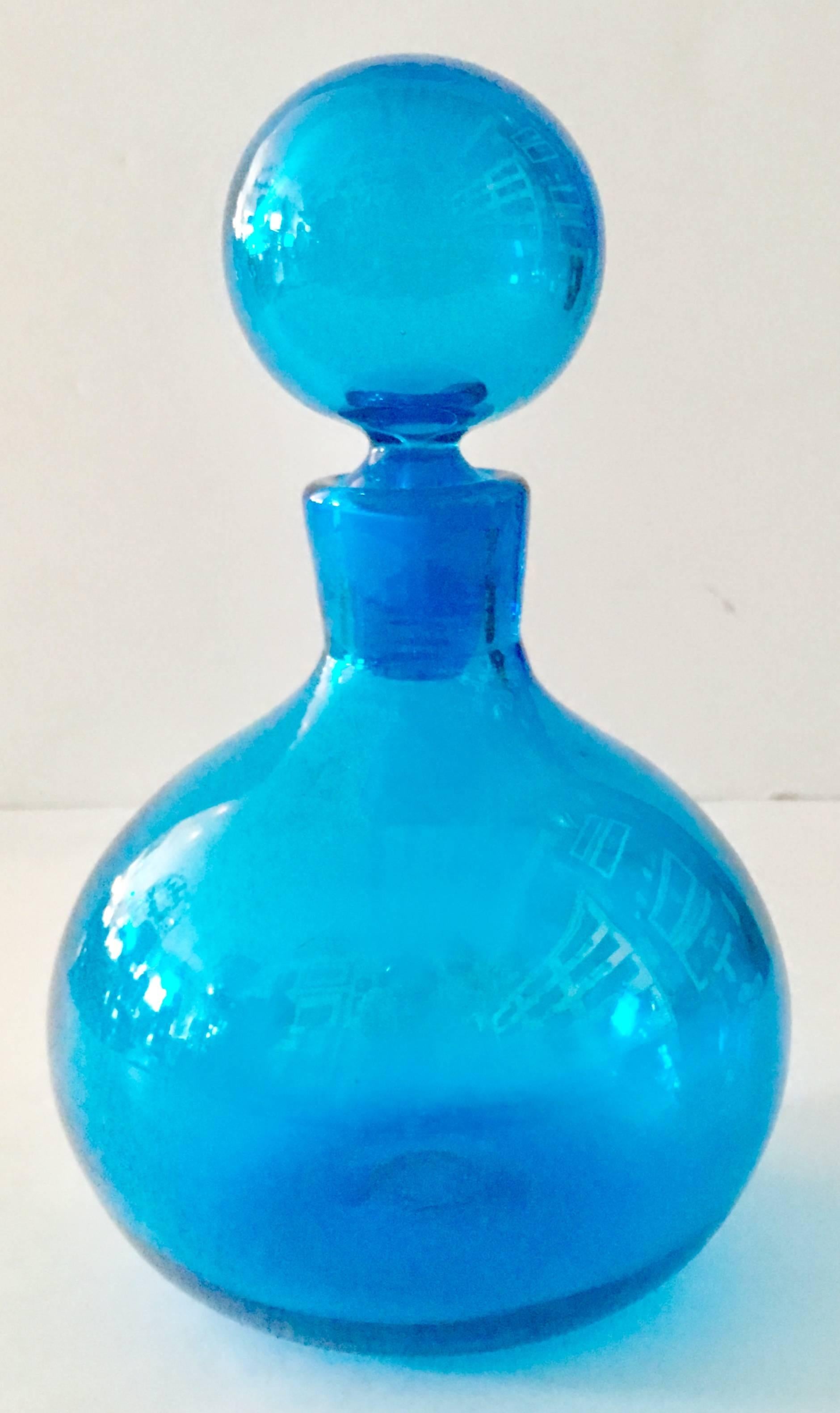 Vintage Blenko glass blown glass blue round and bulbous decanter with stopper.