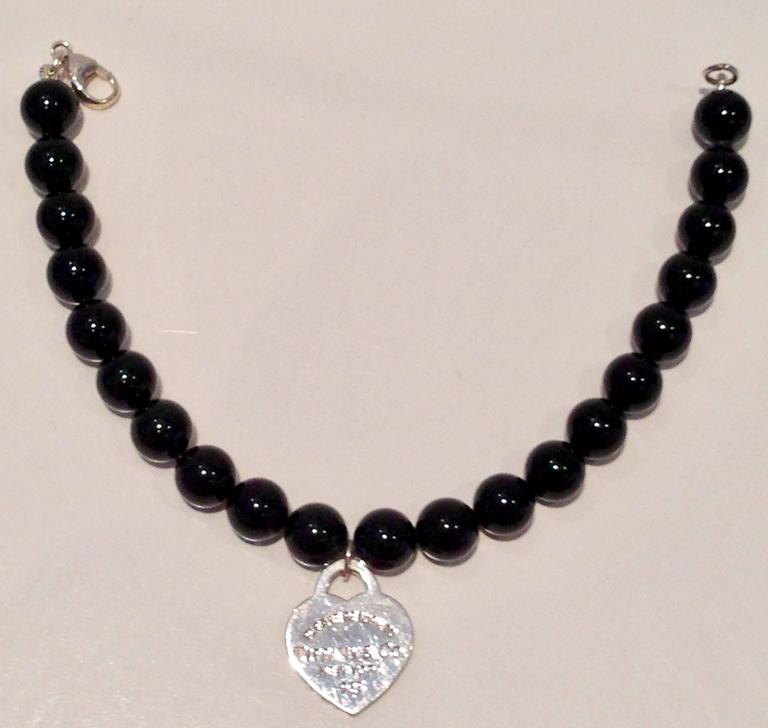 Tiffany and Co. Silver Heart Tag 7.5' Black Onyx Bead Bracelet at 1stDibs | tiffany  onyx bracelet, tiffany and co onyx bracelet, tiffany and co black bead  bracelet