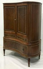 1920'S Louis Style Kidney Flame Mahogany Rolling Armoire Cabinet