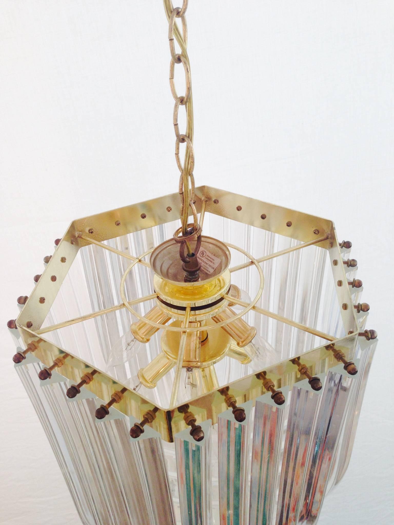 American Hollywood Regency Brass and Lucite Ribbon Loop Chandelier