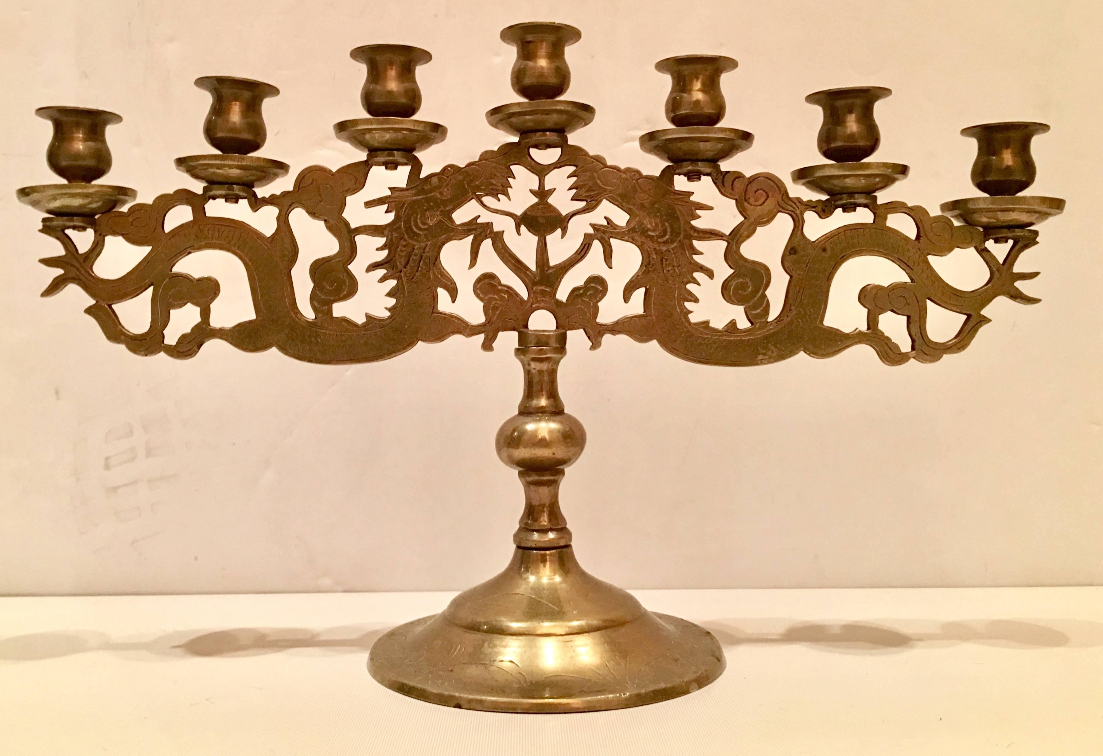 20th Century Solid brass seven-light dragon motif candelabra.