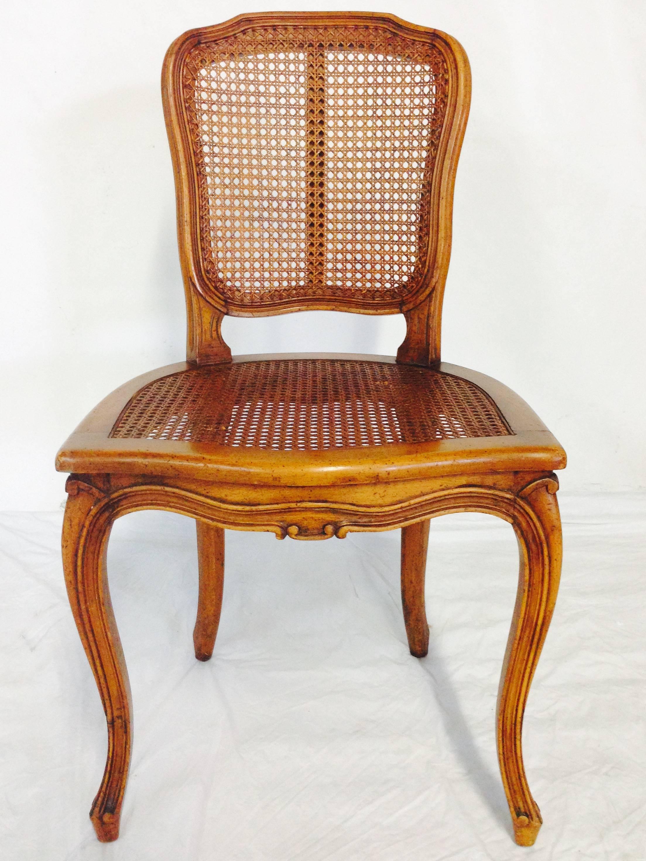 French Provincial Mid-Century Pair Of French Style Carved Wood & Cane Chairs For Sale